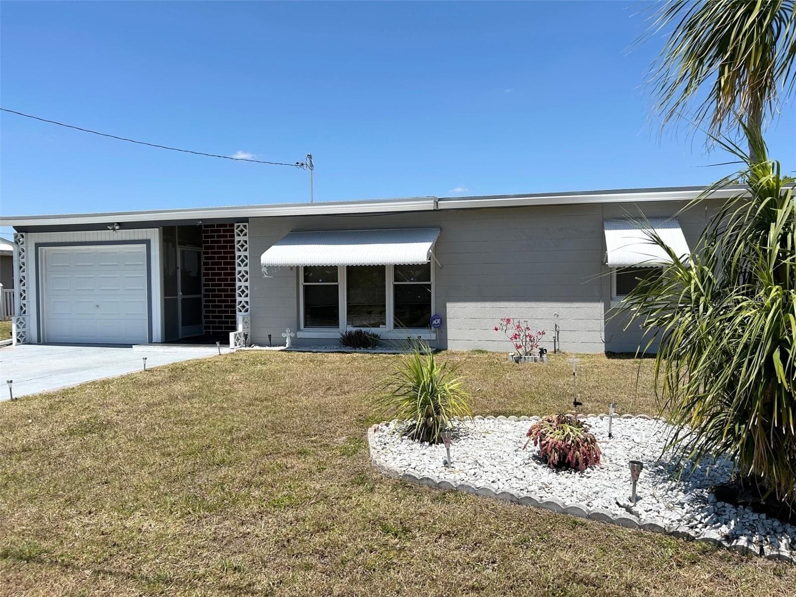 Single Family Residence at 123 POINSETTIA CIR NE, PORT CHARLOTTE, photo 2 of 90