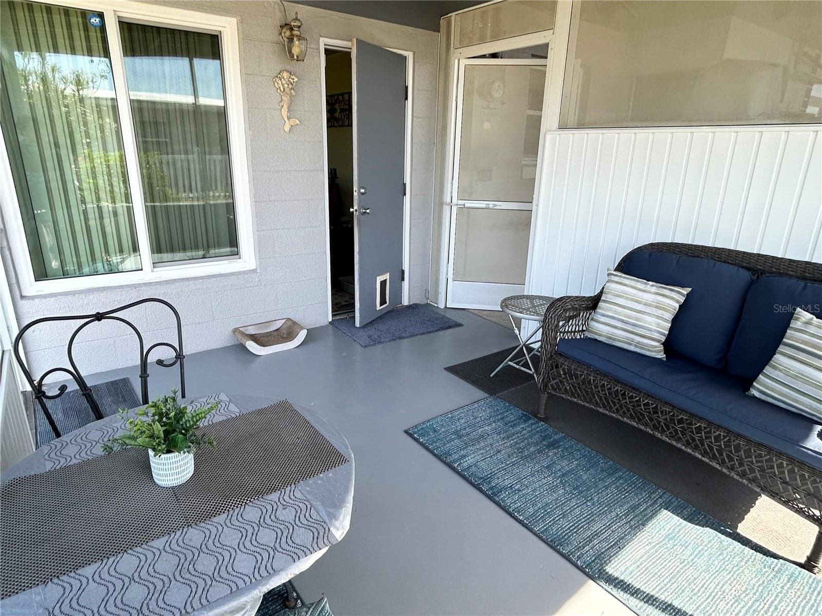 LANAI W DR TO BACK - 123 POINSETTIA CIR NE, PORT CHARLOTTE