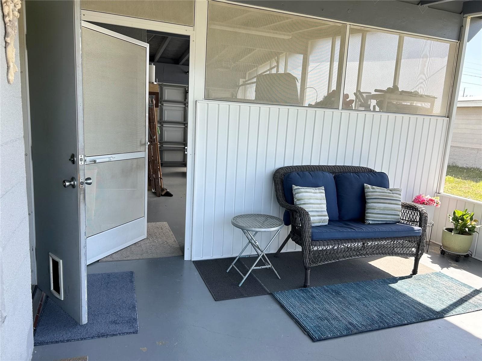 DOOR TO GARAGE, LAUN RM & STORAGE - 123 POINSETTIA CIR NE, PORT CHARLOTTE