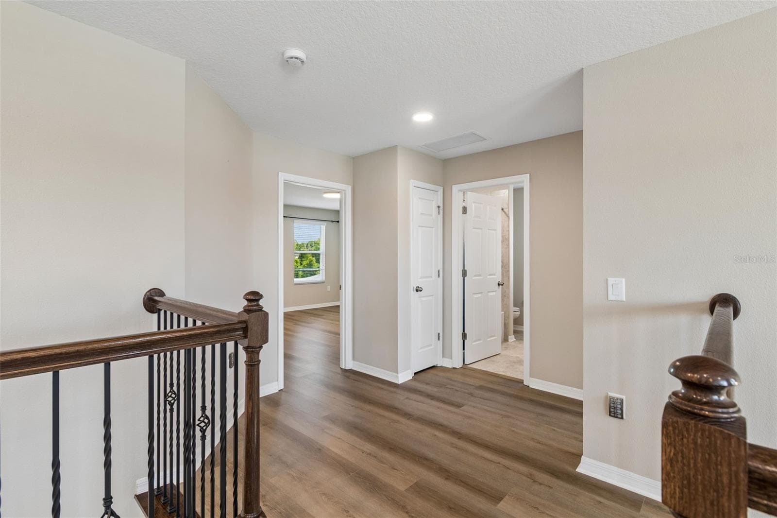 Hallway to Bed 3&4 - 17647 CORTES CREEK BLVD, SPRING HILL