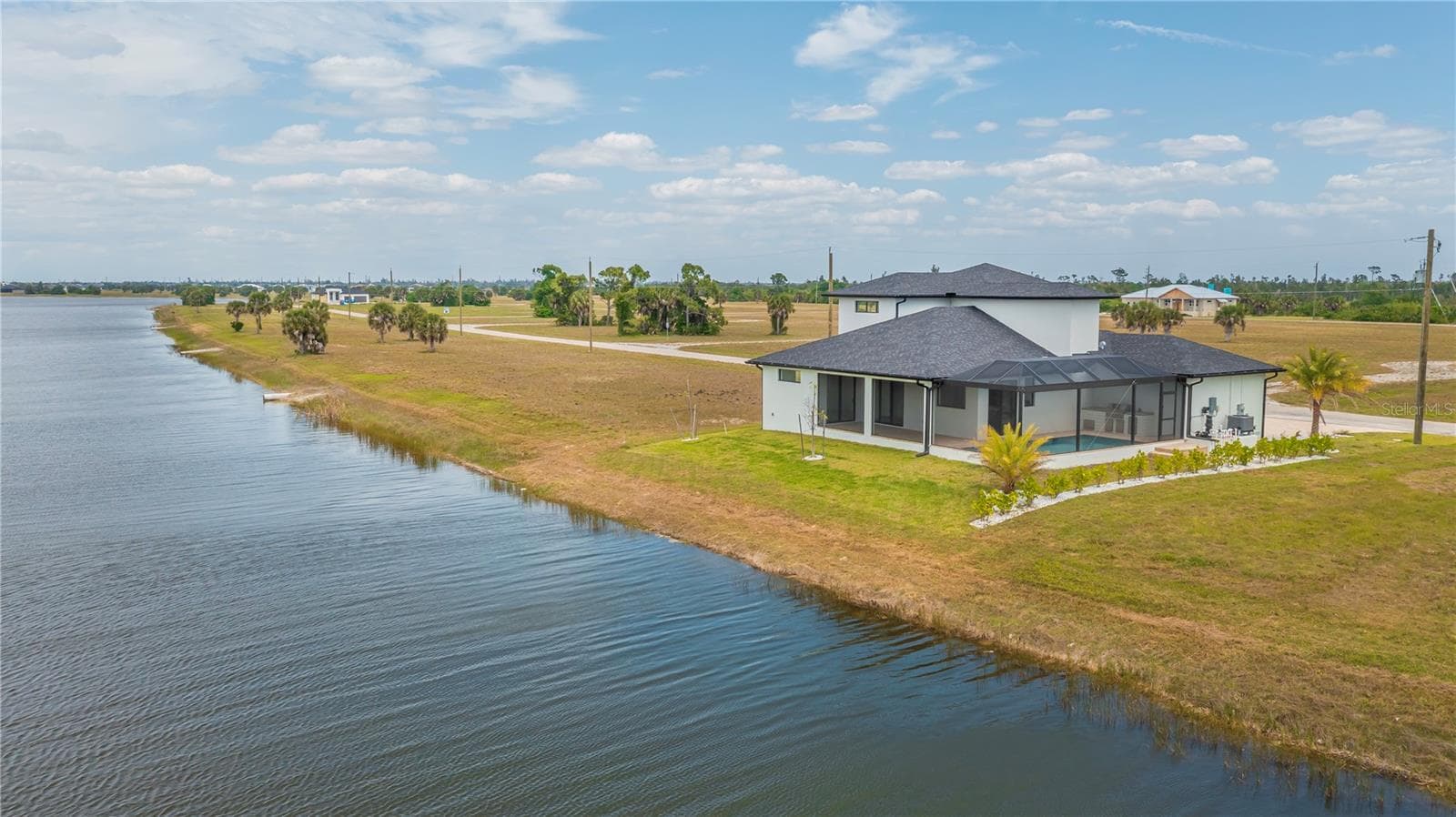 Tranquil Water Views from the Backyard. - 7 SUNFLOWER DR, PLACIDA