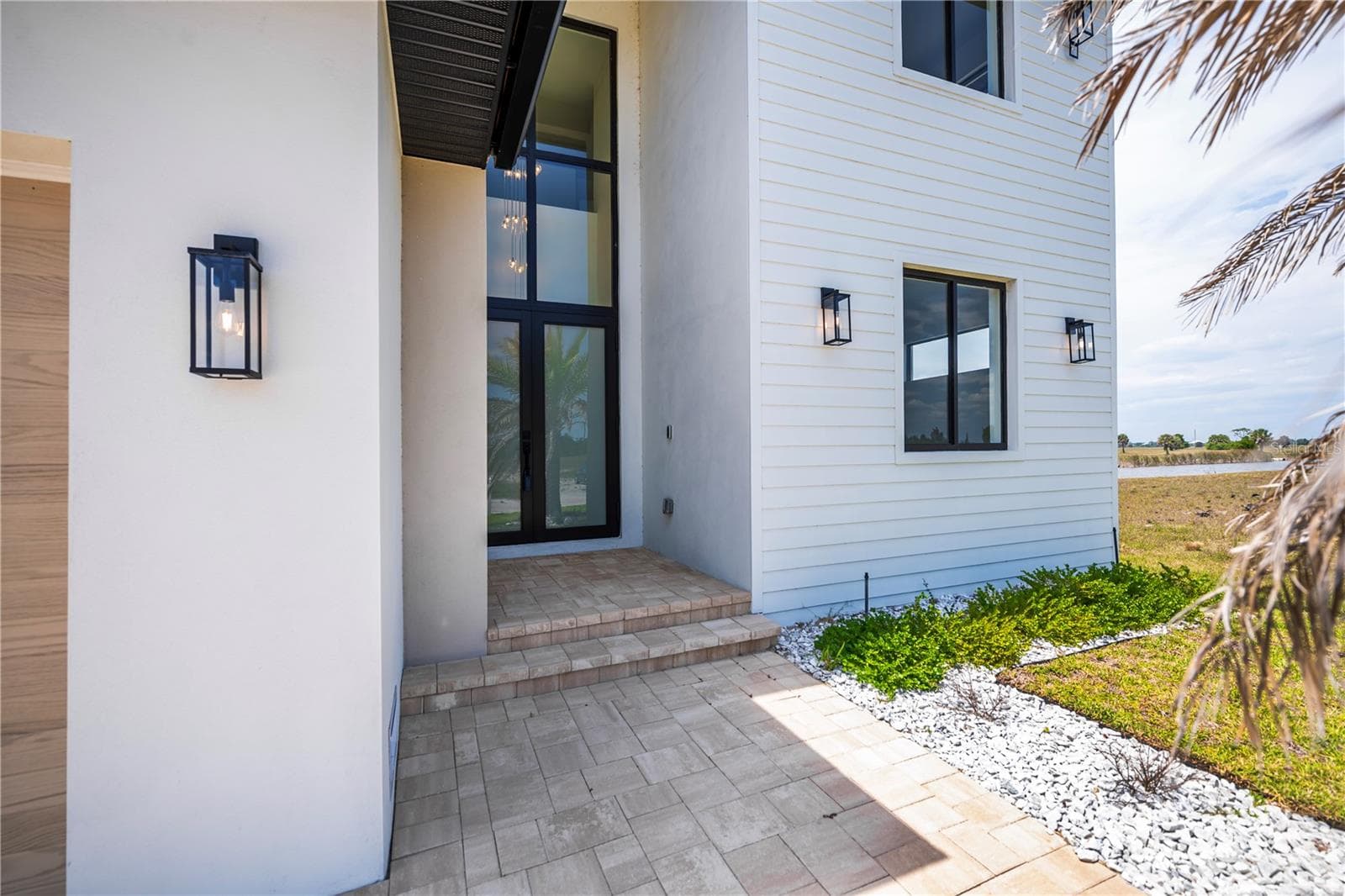 Soaring Tiered Glass Entryway. - 7 SUNFLOWER DR, PLACIDA