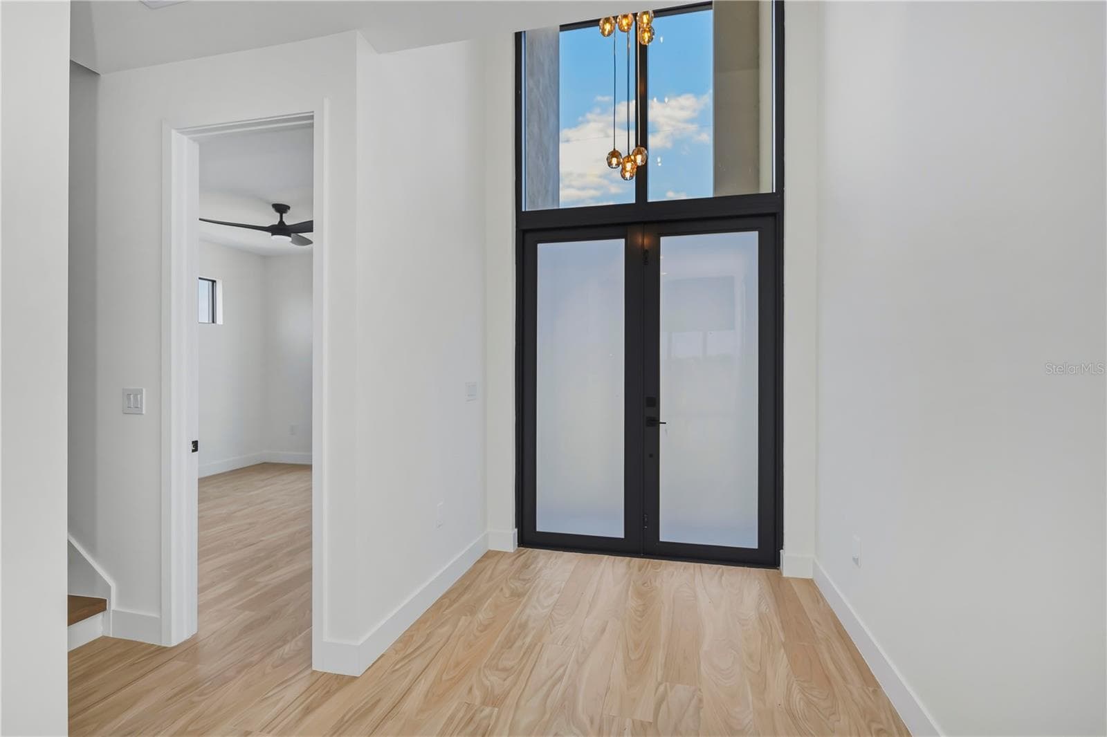 Grand Entryway with Soaring Glass Accent Window. - 7 SUNFLOWER DR, PLACIDA