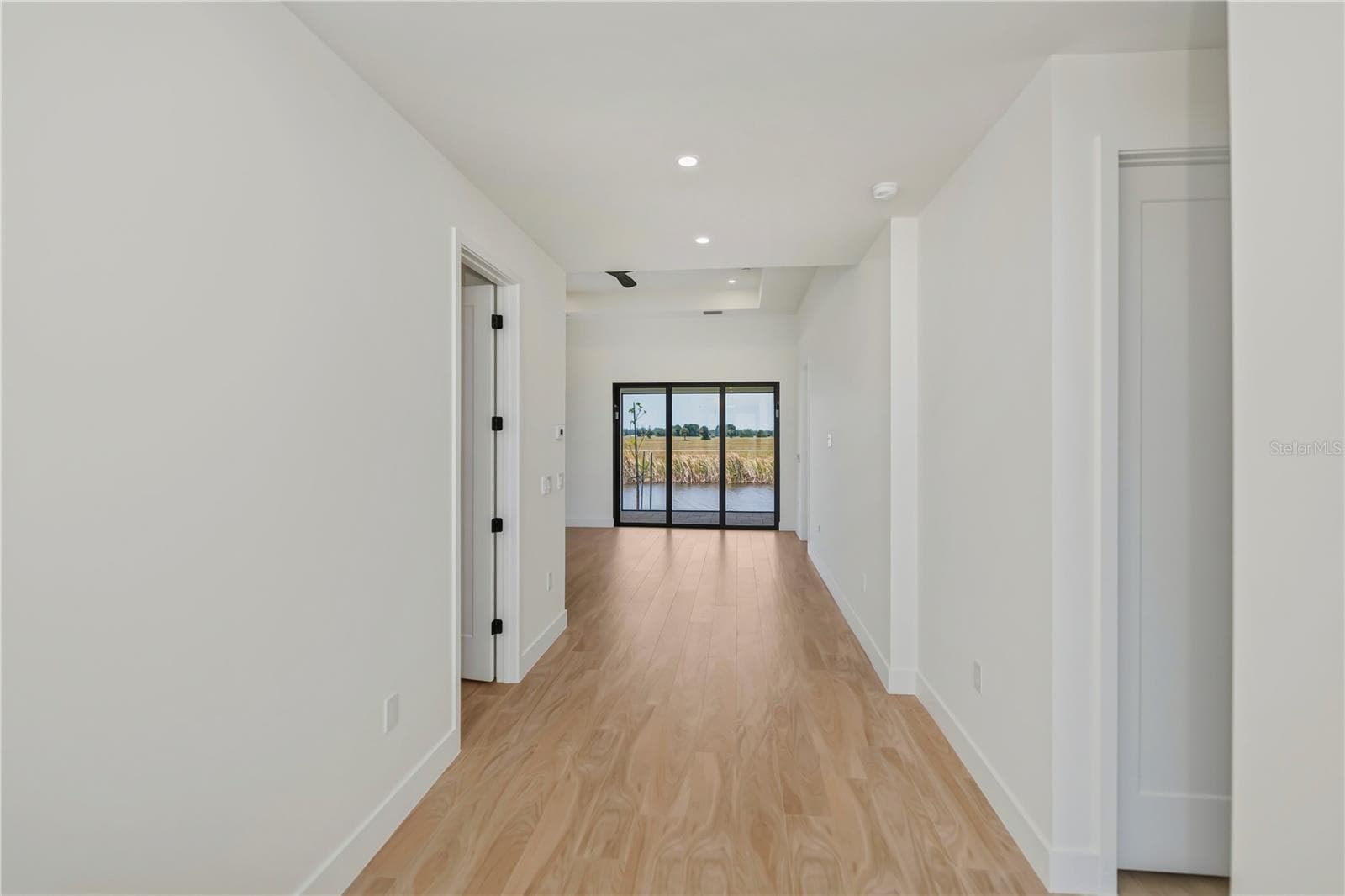 Light Filled Hallway with Water Views. - 7 SUNFLOWER DR, PLACIDA