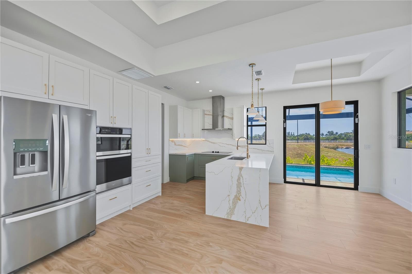 Chef Style Kitchen with Quartz Waterfall Countertops - 7 SUNFLOWER DR, PLACIDA