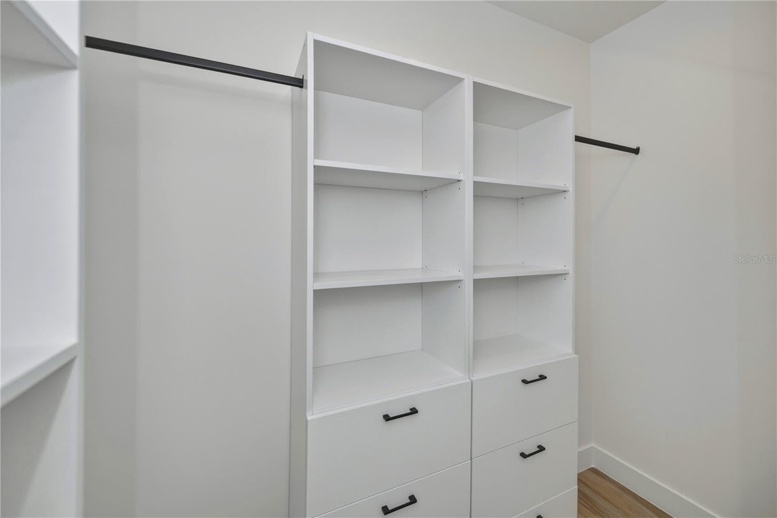Primary Bedroom California Style Cabinety Walk in Closet - 7 SUNFLOWER DR, PLACIDA