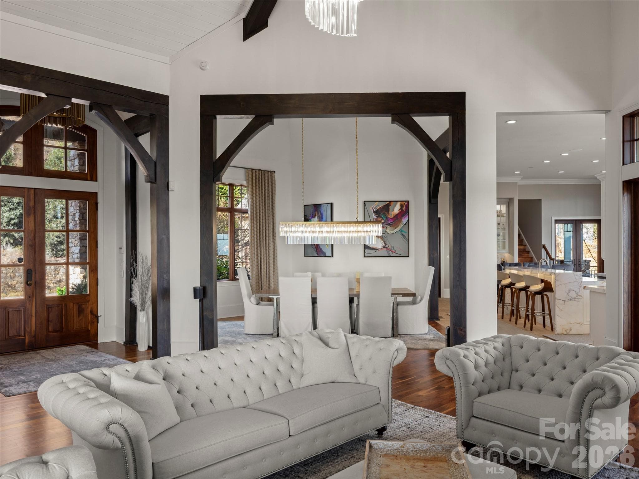 grand room looking towards the formal dining area and kitchen - 47 Ridge Pine Trail, Arden