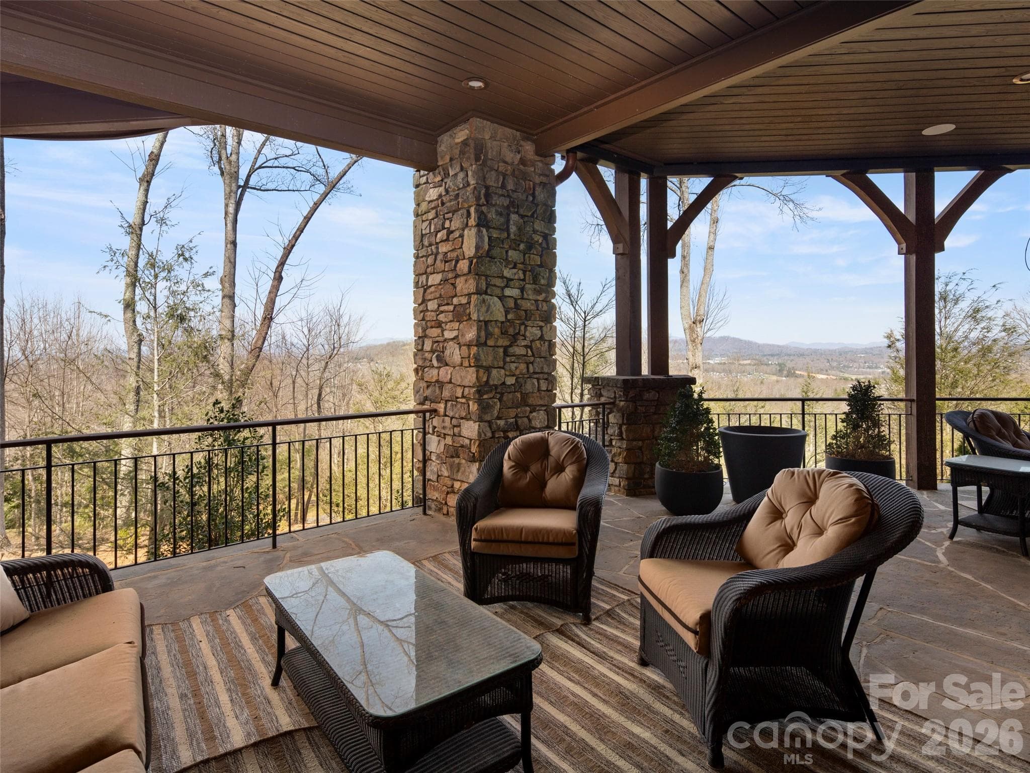 covered dock by one of two deck fireplaces - 47 Ridge Pine Trail, Arden