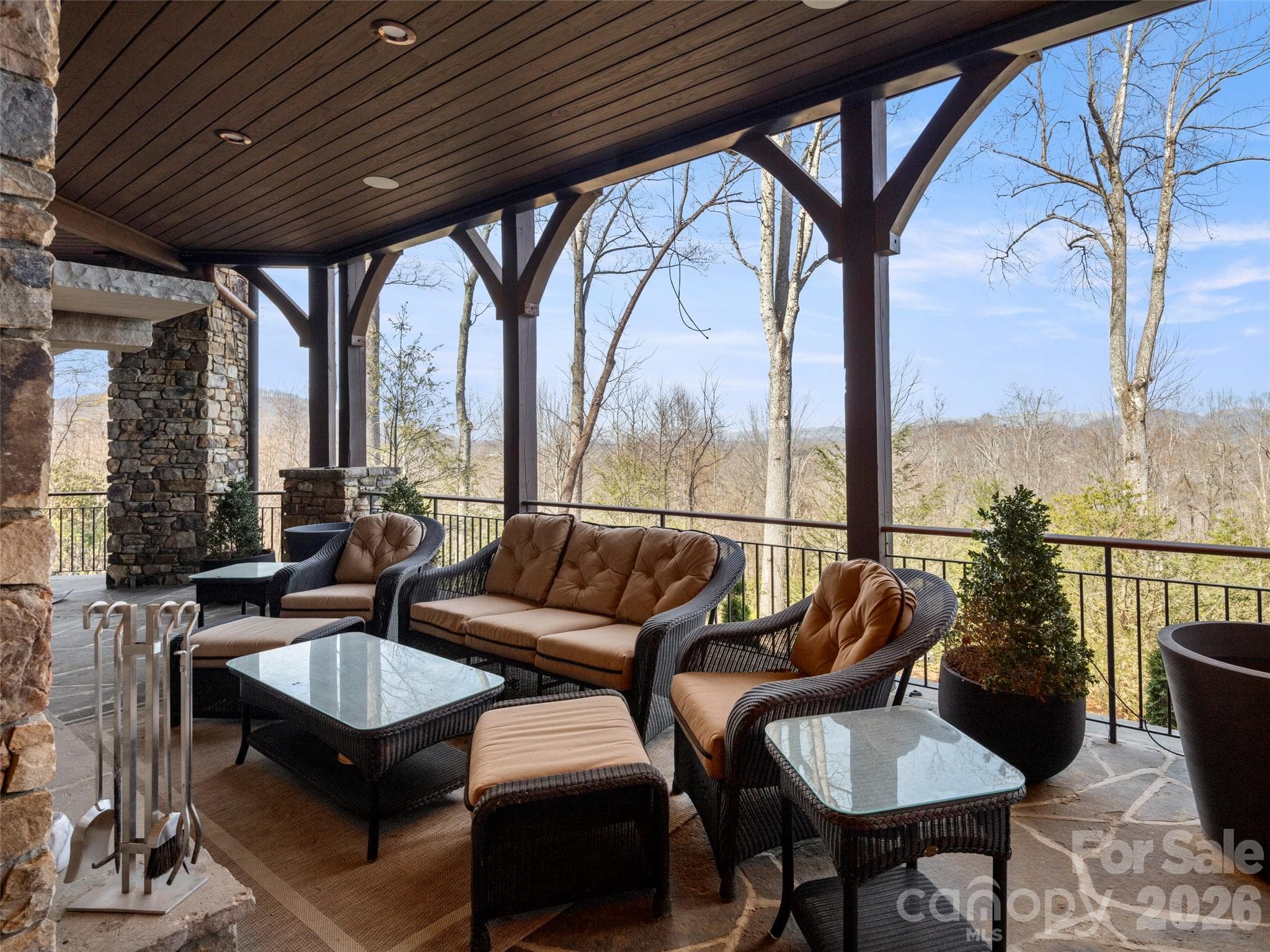 second outdoor covered sitting area with gas fireplace - 47 Ridge Pine Trail, Arden