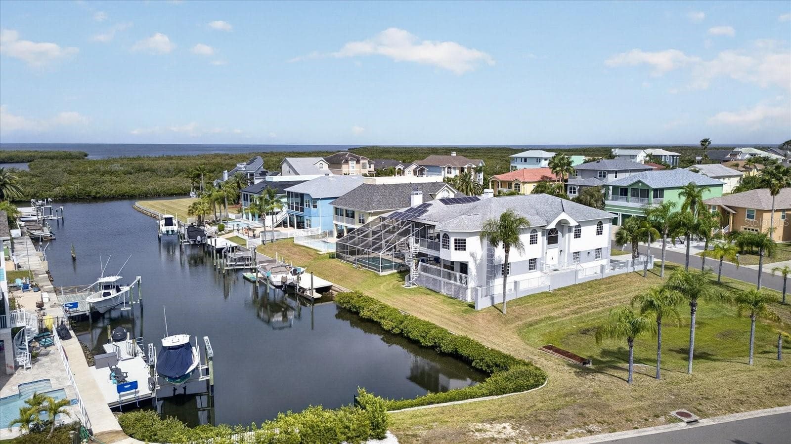 View of deep channel to Gulf behind home and large corner lot - 4340 SEAGULL DR, NEW PORT RICHEY