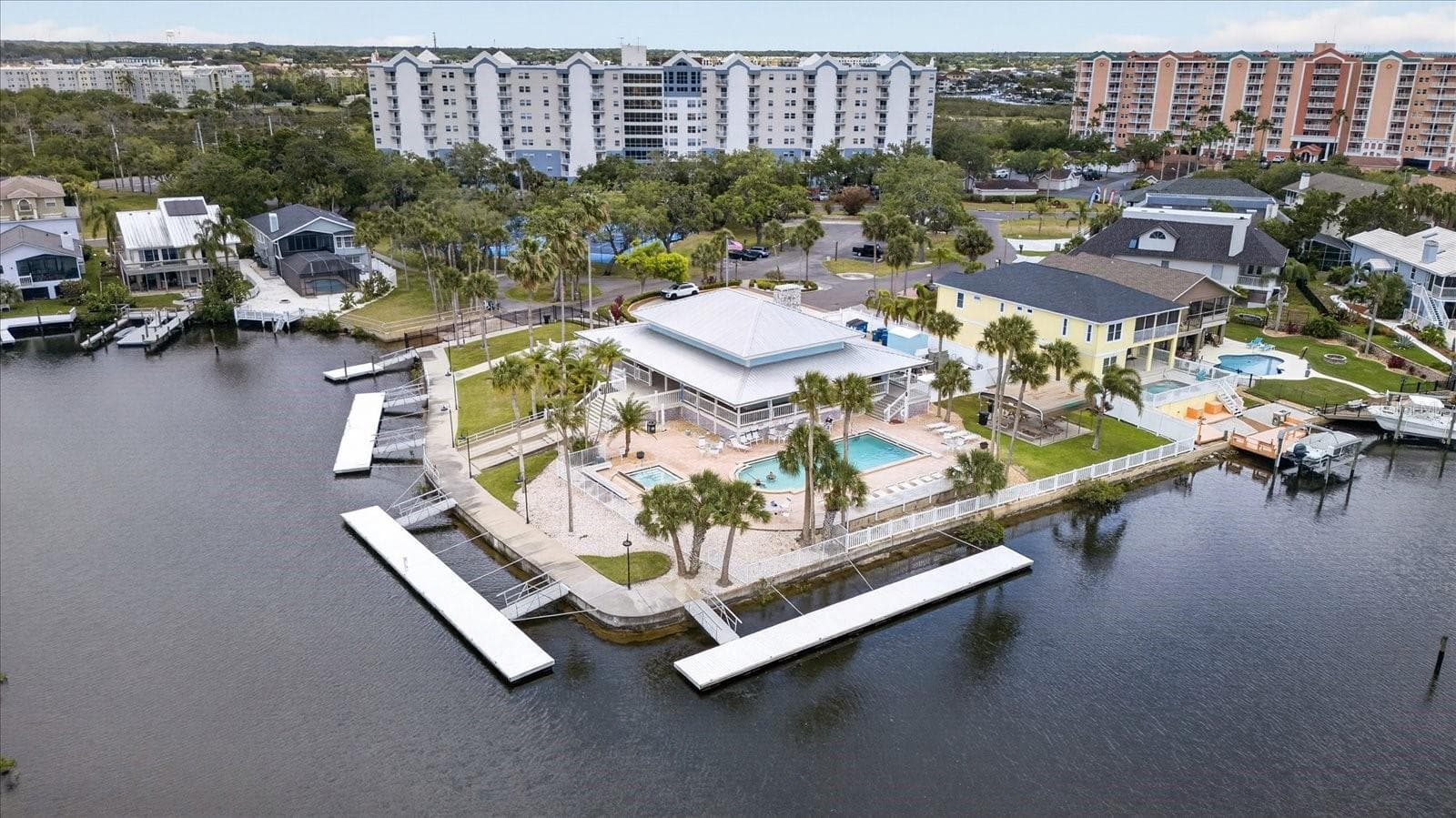 Gulf Landings Clubhouse and Pool with hot tub and sauna room. - 4340 SEAGULL DR, NEW PORT RICHEY