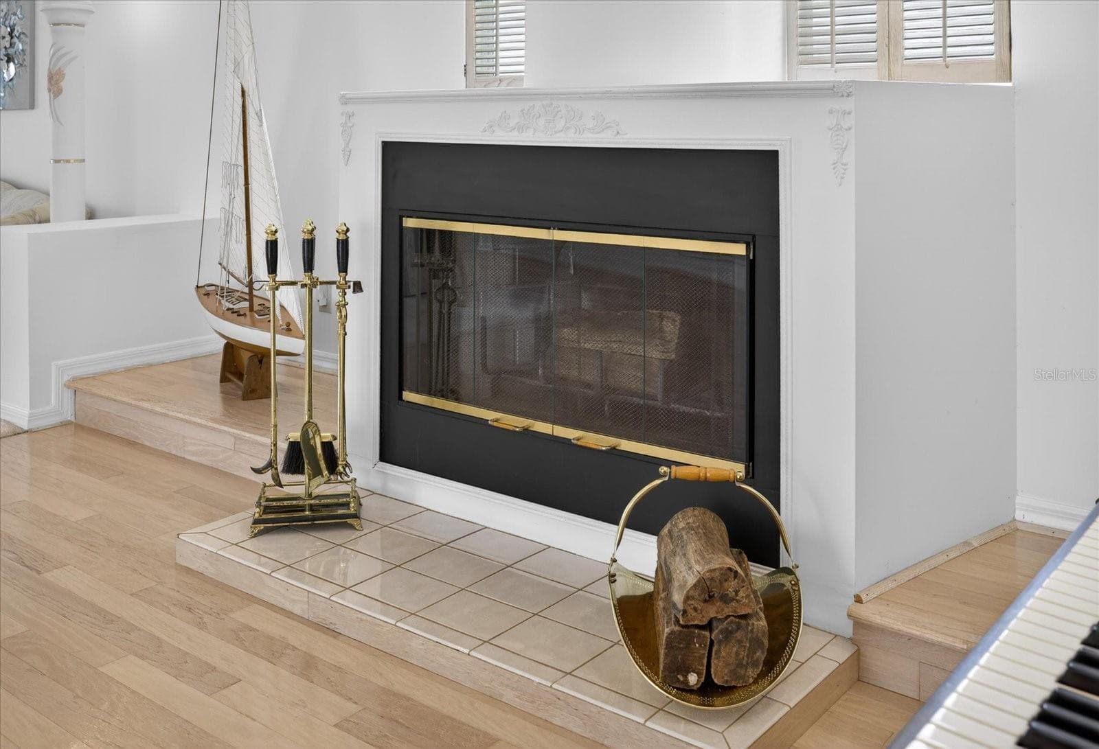 Upper level close up of wood fireplace - 4340 SEAGULL DR, NEW PORT RICHEY