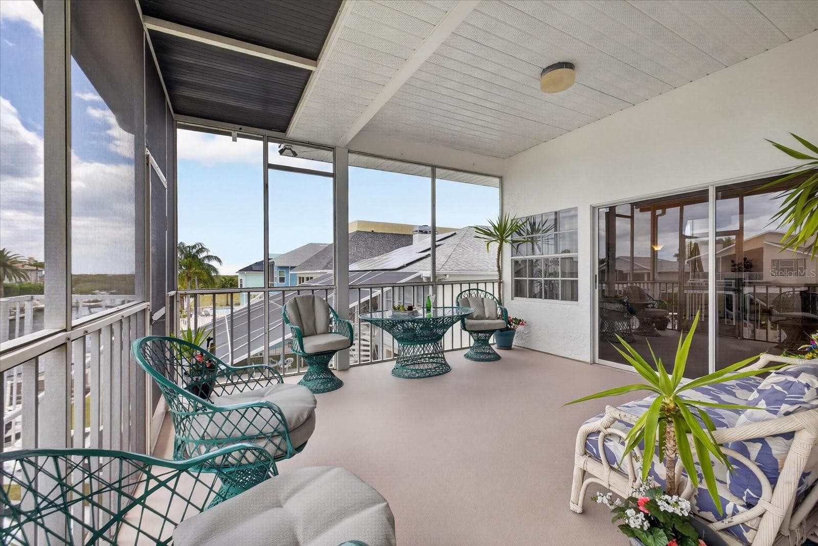 Upper waterfront balcony-screened - 4340 SEAGULL DR, NEW PORT RICHEY
