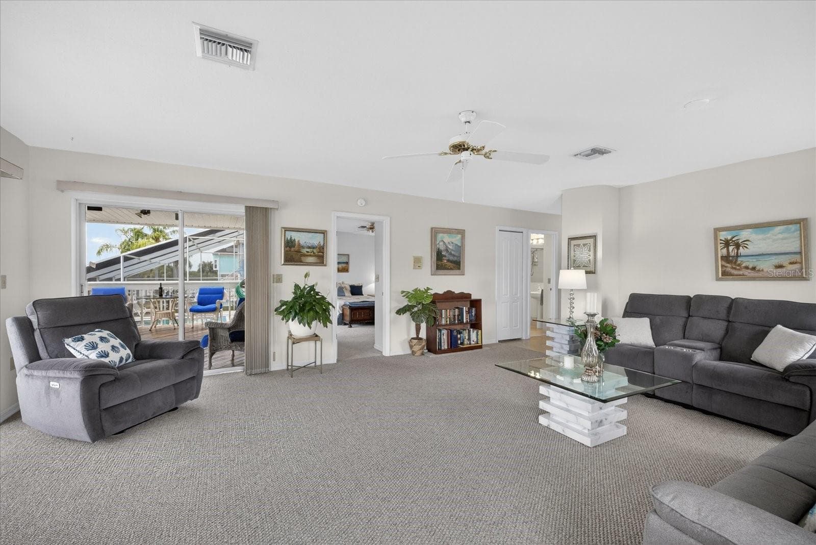 Family room looking toward guest room 3 - 4340 SEAGULL DR, NEW PORT RICHEY