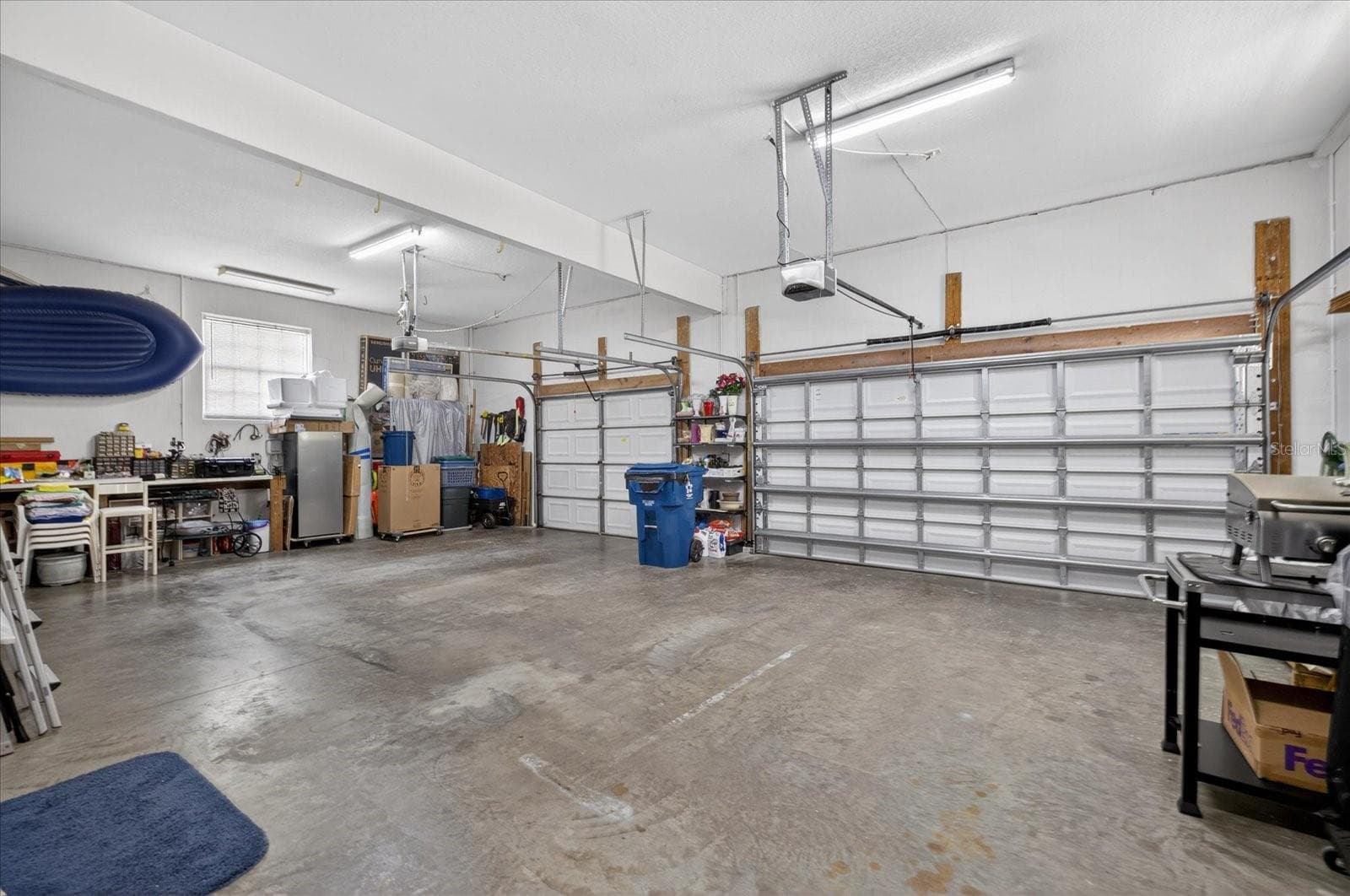 Spacious 3 car garage with two automatic doors - 4340 SEAGULL DR, NEW PORT RICHEY