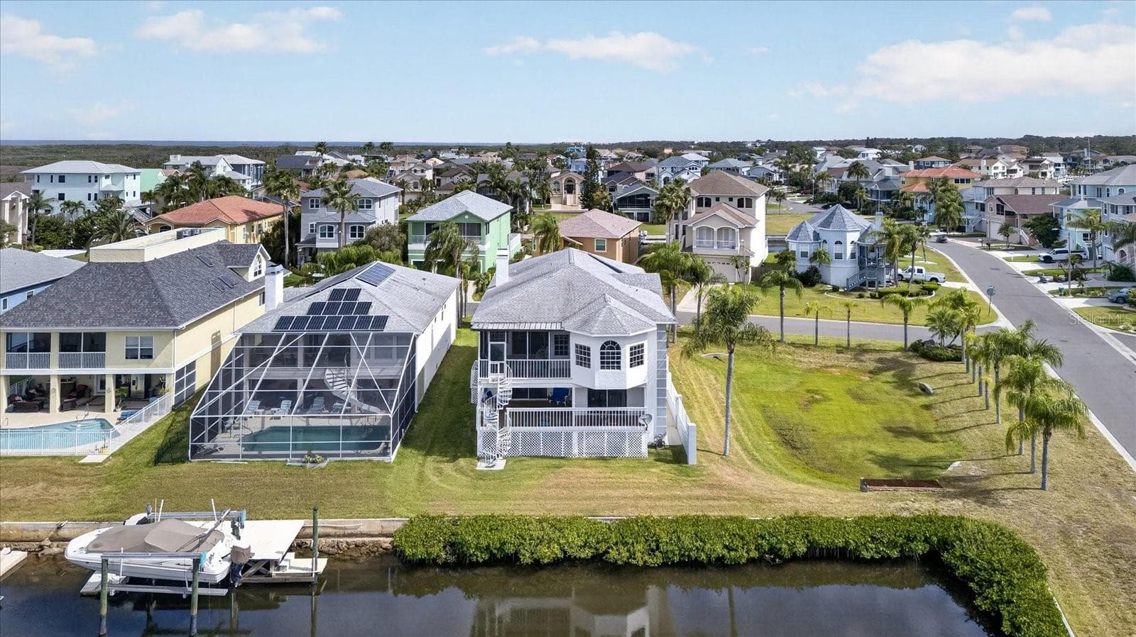 Home lot with seawall extending around corner - 4340 SEAGULL DR, NEW PORT RICHEY
