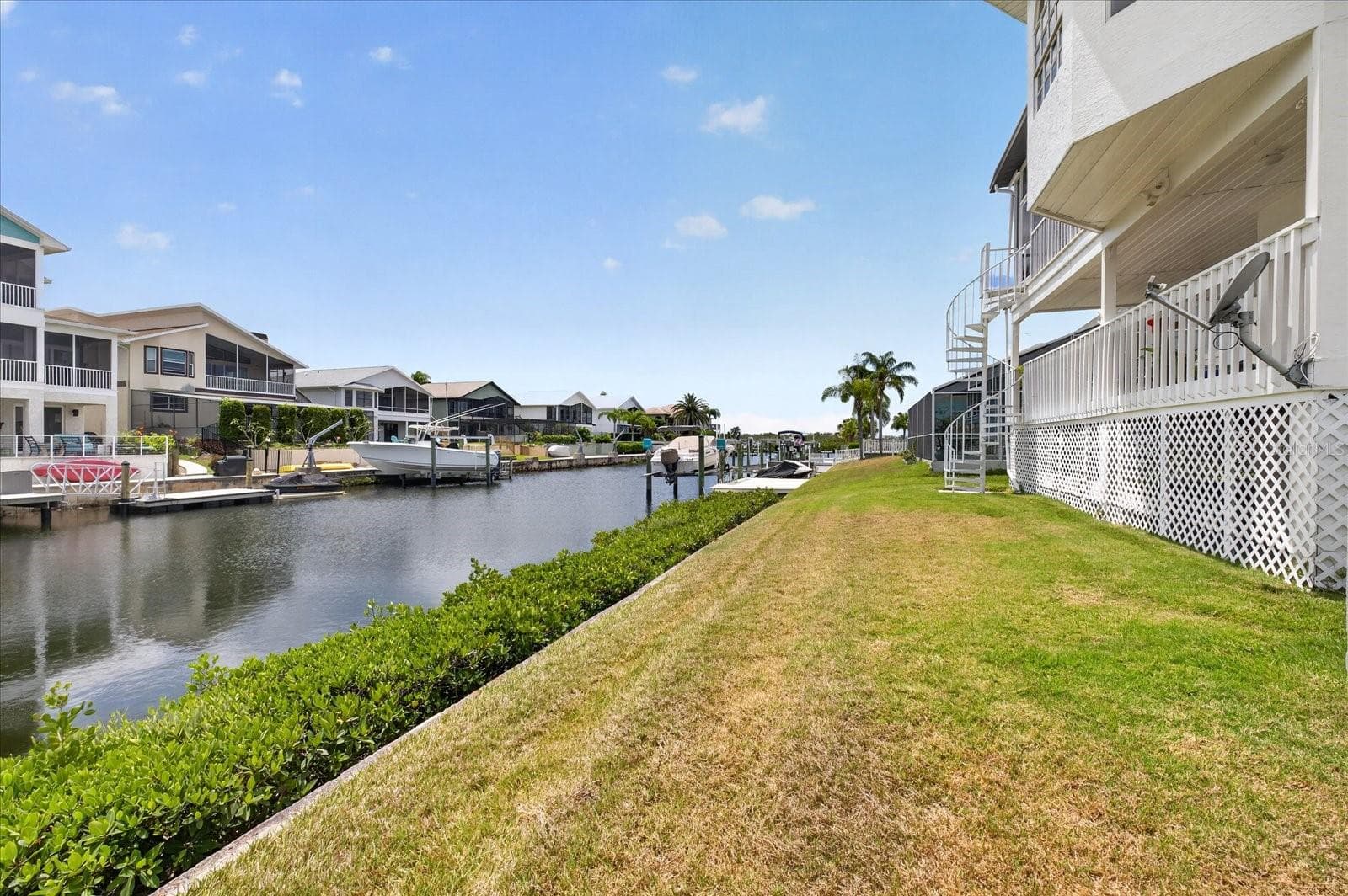 Backyard view looking west down channel towards Gulf - 4340 SEAGULL DR, NEW PORT RICHEY