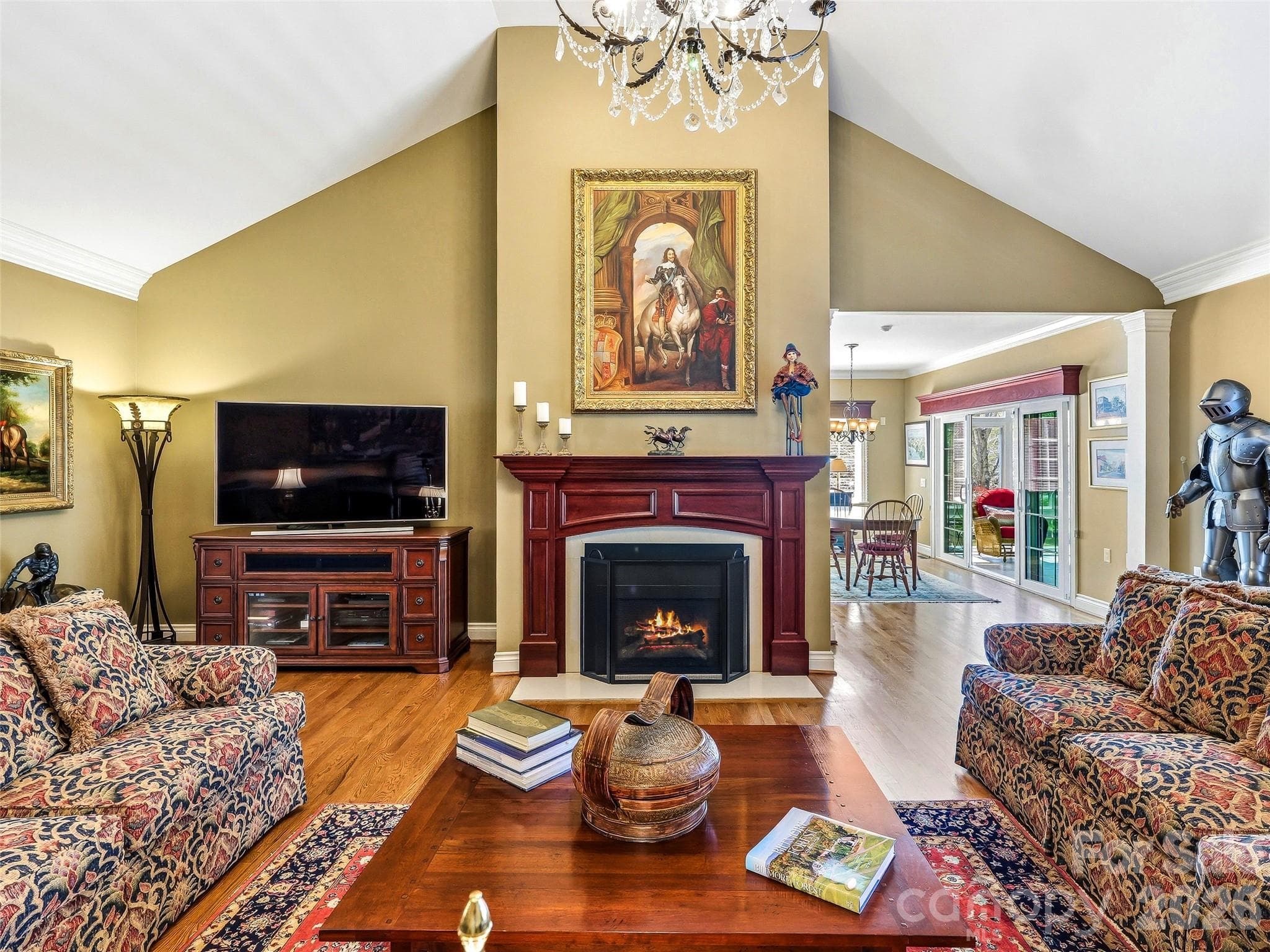 The mantel and fireplace surround were custom built by a local craftsman. - 33 Tiverton Lane, Asheville
