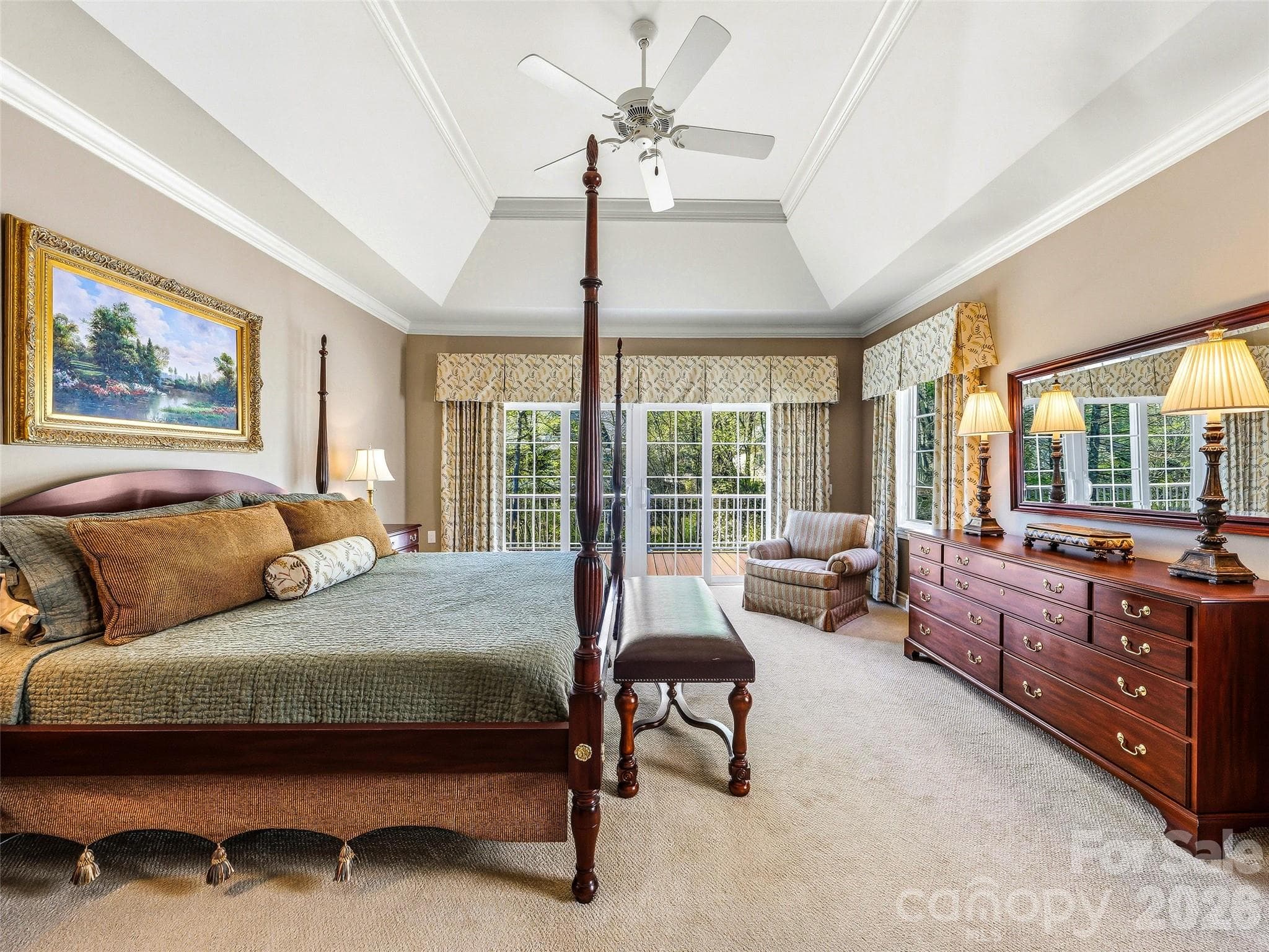 The beautiful designer draperies in the primary bedroom will stay with the home. - 33 Tiverton Lane, Asheville