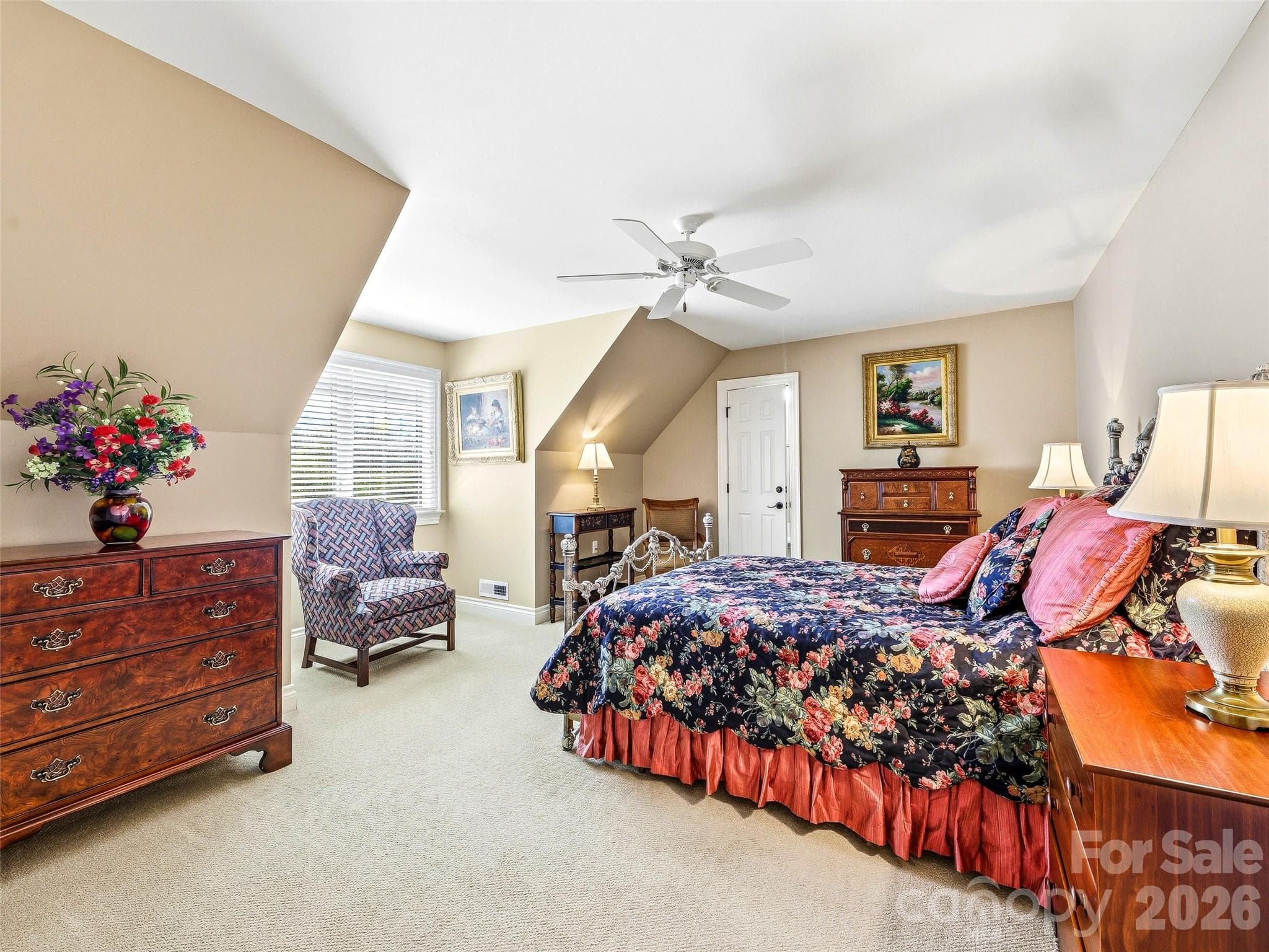 There is a large finished closet/storage area off the upstairs guest bedroom, which also has access to a walk-in attic. - 33 Tiverton Lane, Asheville