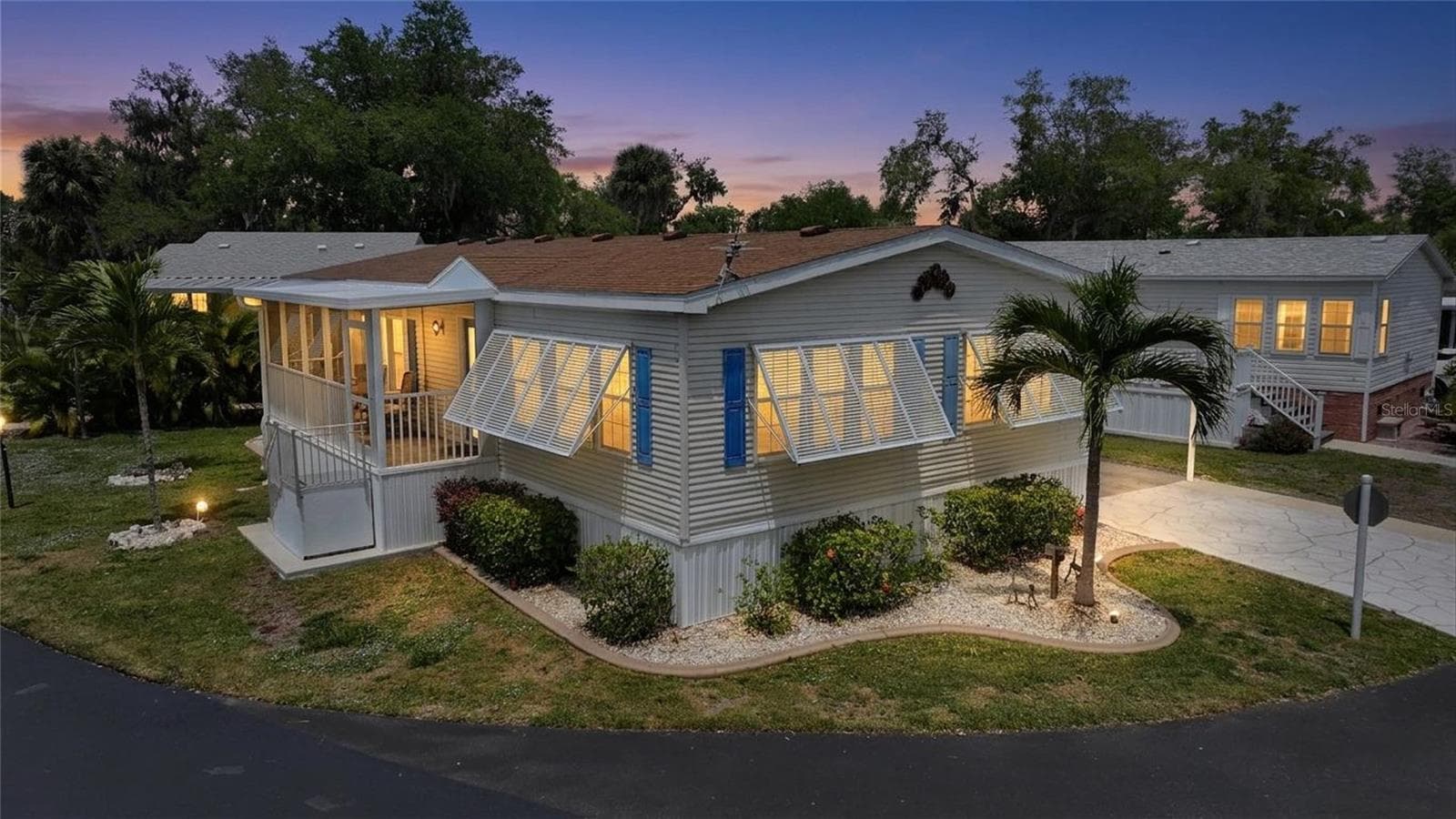 Manufactured Home at 10303 BURNT STORE RD #143, PUNTA GORDA, photo 2 of 42