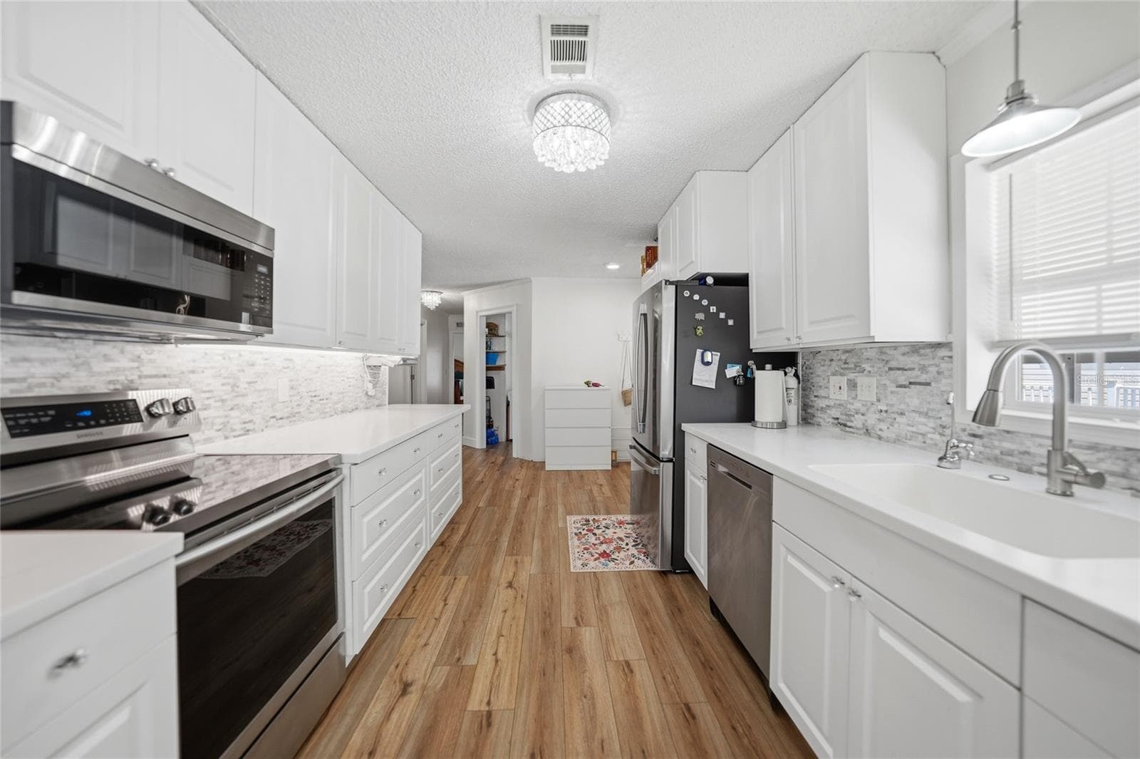 Manufactured Home at 10303 BURNT STORE RD #143, PUNTA GORDA, photo 5 of 42