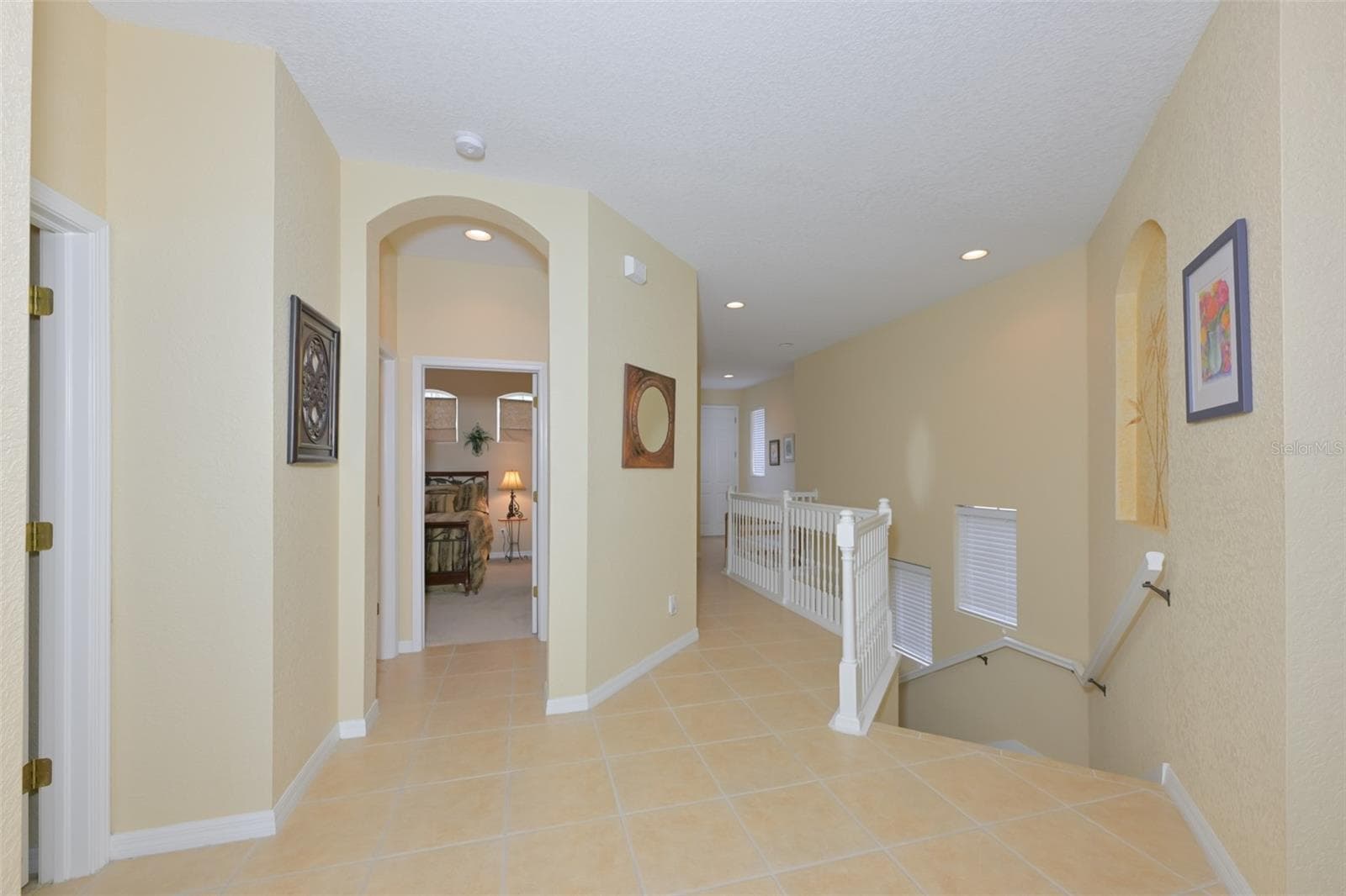 Walkway from the elevator looking into bedroom 2. - 1330 EMERALD DUNES DR, SUN CITY CENTER