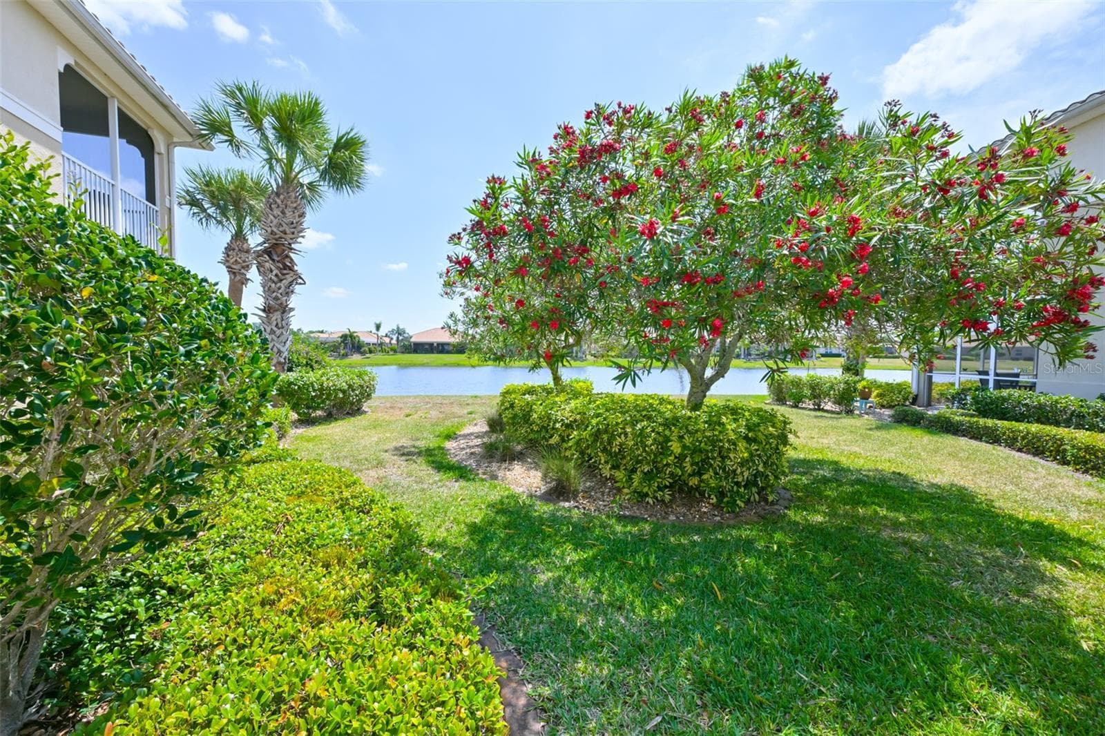 All lawn and landscaping is maintained by your COA. - 1330 EMERALD DUNES DR, SUN CITY CENTER