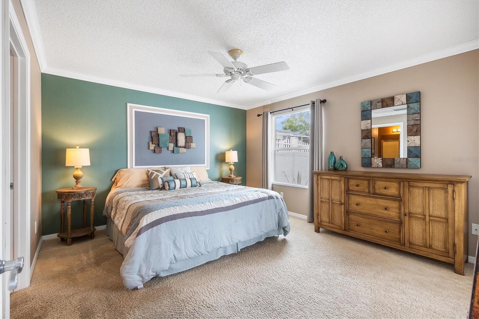 PRIMARY BEDROOM WITH ENSUITE BATH - 979 SMYRNA ST, THE VILLAGES