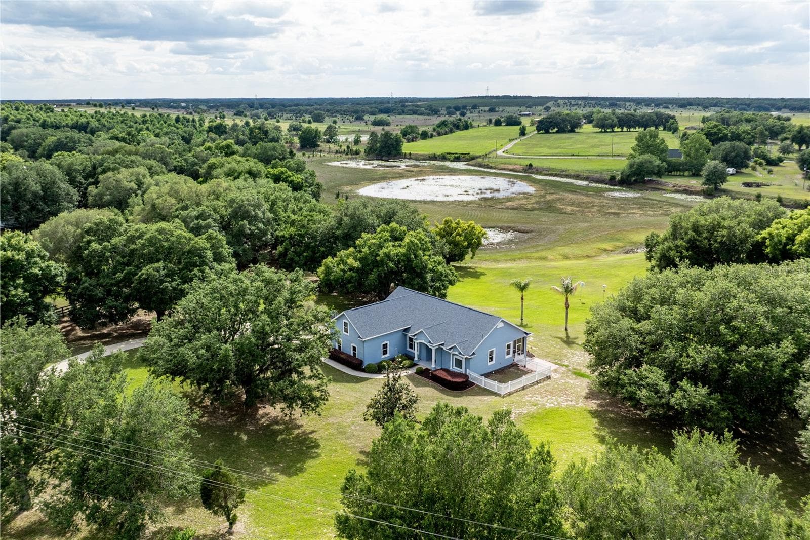 Single Family Residence at 25101 TURKEY LAKE RD, HOWEY IN THE HILLS, photo 2 of 59