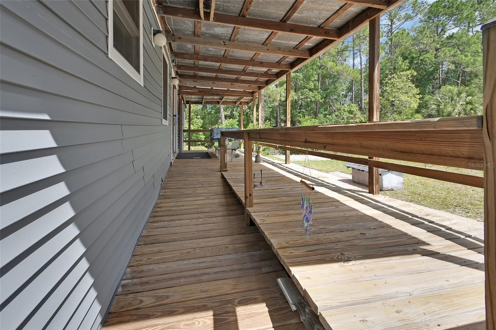 front porch with ramp - 25801 BLUE LAKES DR, PAISLEY