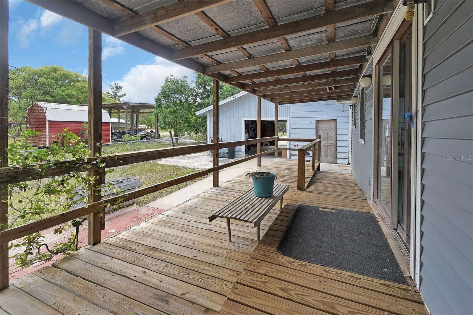 front porch with ramp - 25801 BLUE LAKES DR, PAISLEY