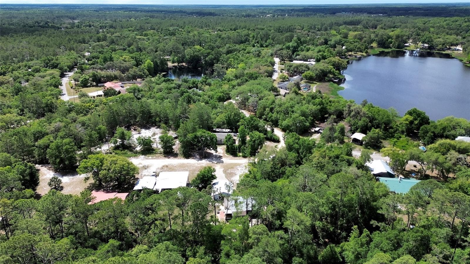 Ariel showing lake LULU - 25801 BLUE LAKES DR, PAISLEY