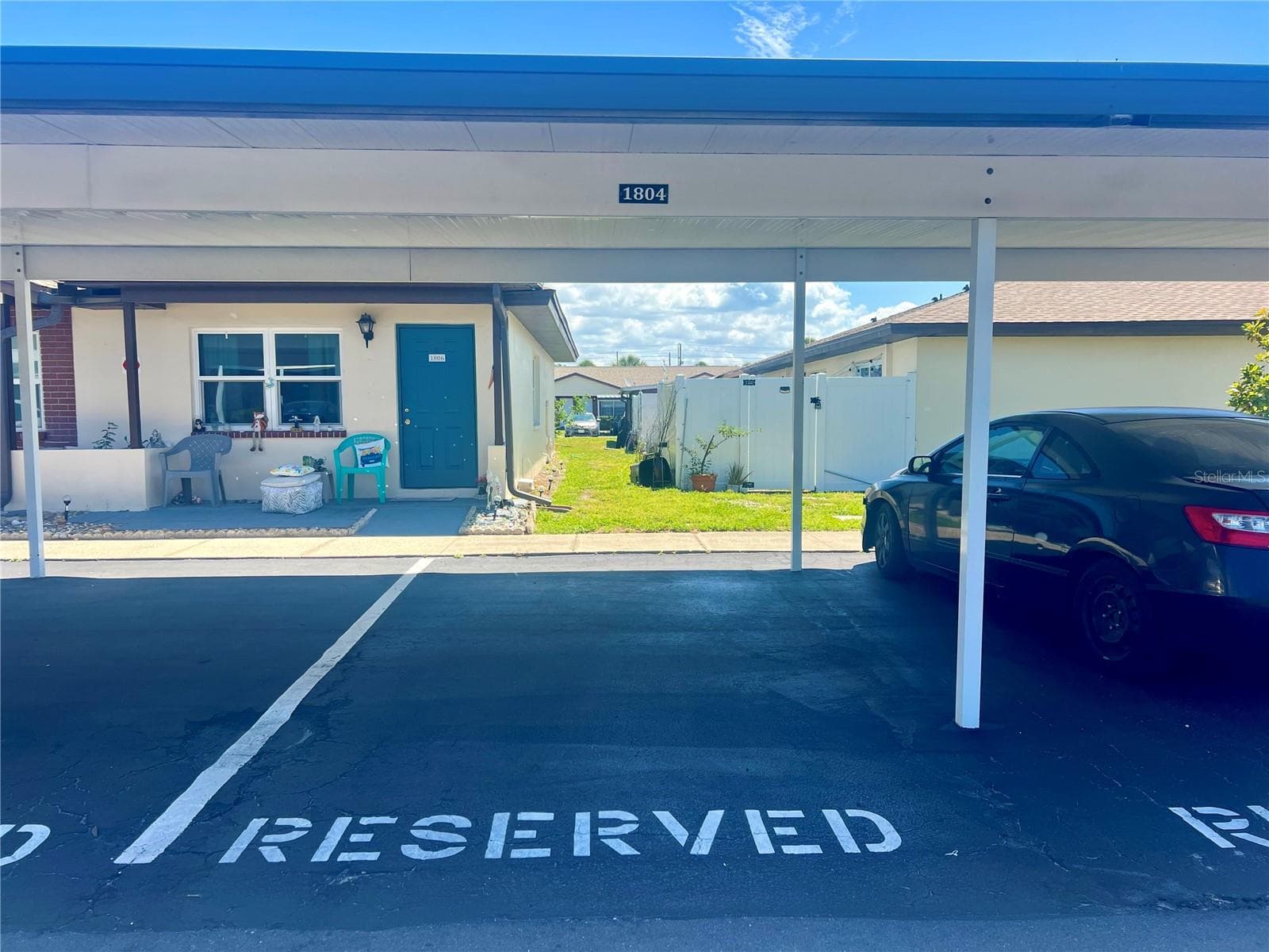 Covered parking & Visitor spot in front - 24862 US HIGHWAY 19 N #1804, CLEARWATER