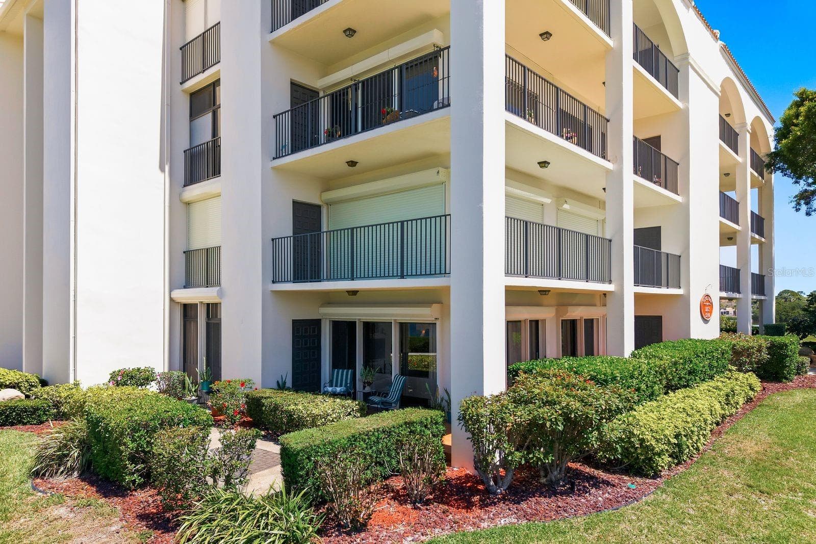 First Floor Corner Unit with Wrap Around Patio - 302 MARINER DR #302, TARPON SPRINGS