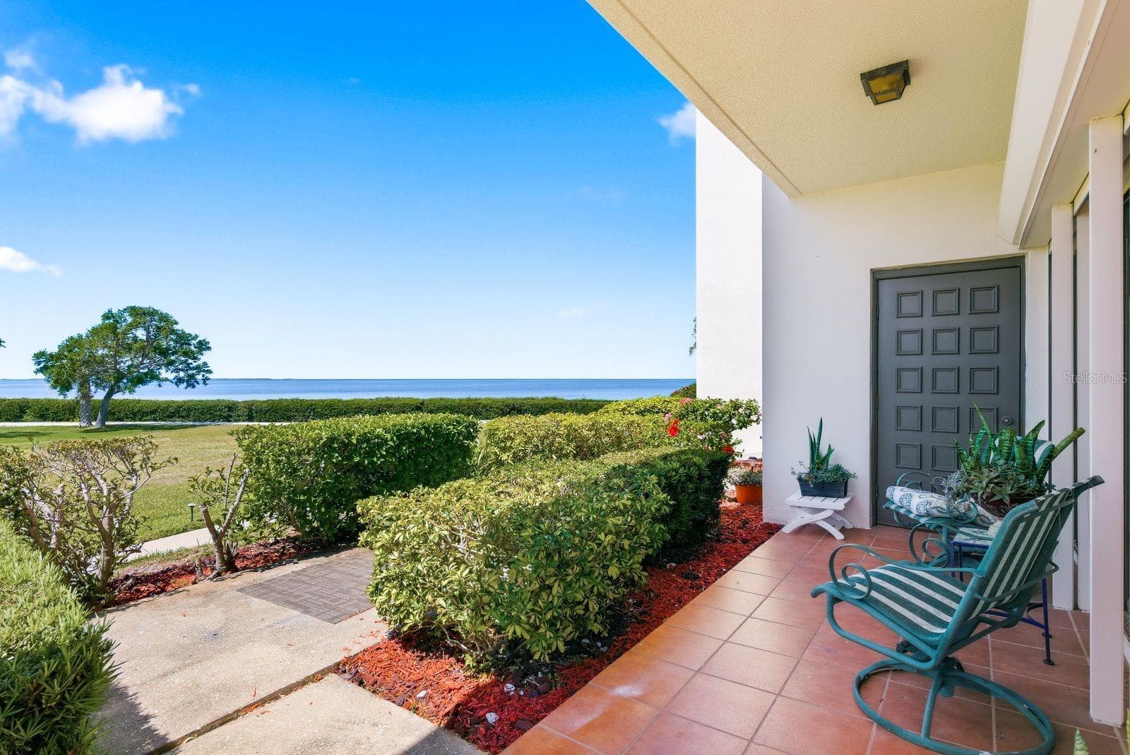 Private Patio Overlooking Gulf - 302 MARINER DR #302, TARPON SPRINGS