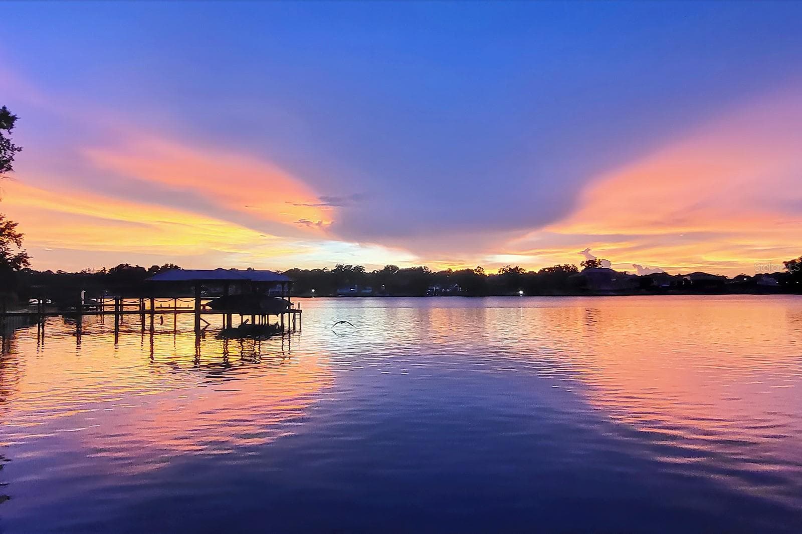 RELAX with a glass of wine, as you have reserved SUNSET seating as you watch the MOONLIGHT dance the night away. - 1351 N CLASSIC CT, LONGWOOD