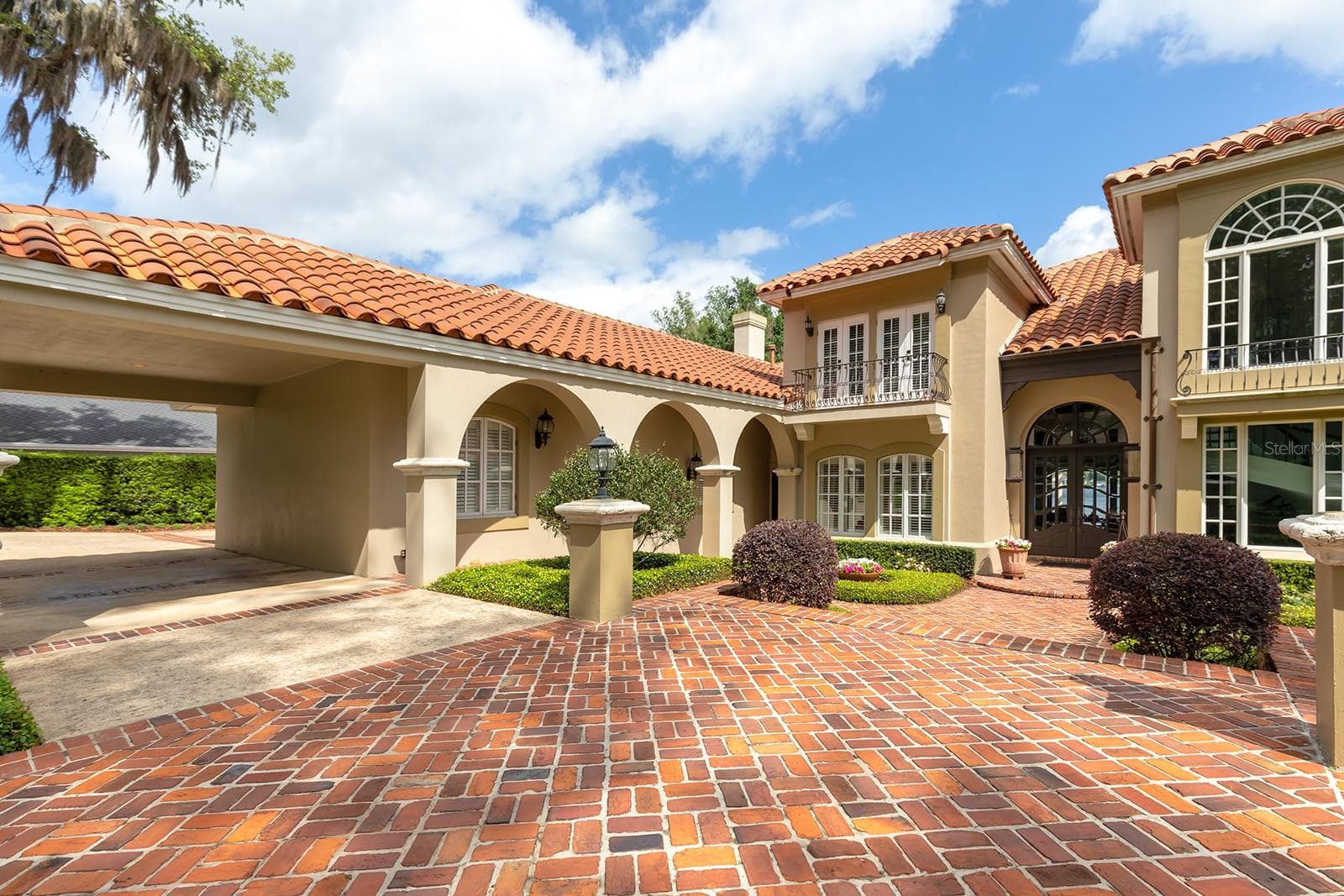 Elegant entry features include PORTE-COCHERE. - 1351 N CLASSIC CT, LONGWOOD