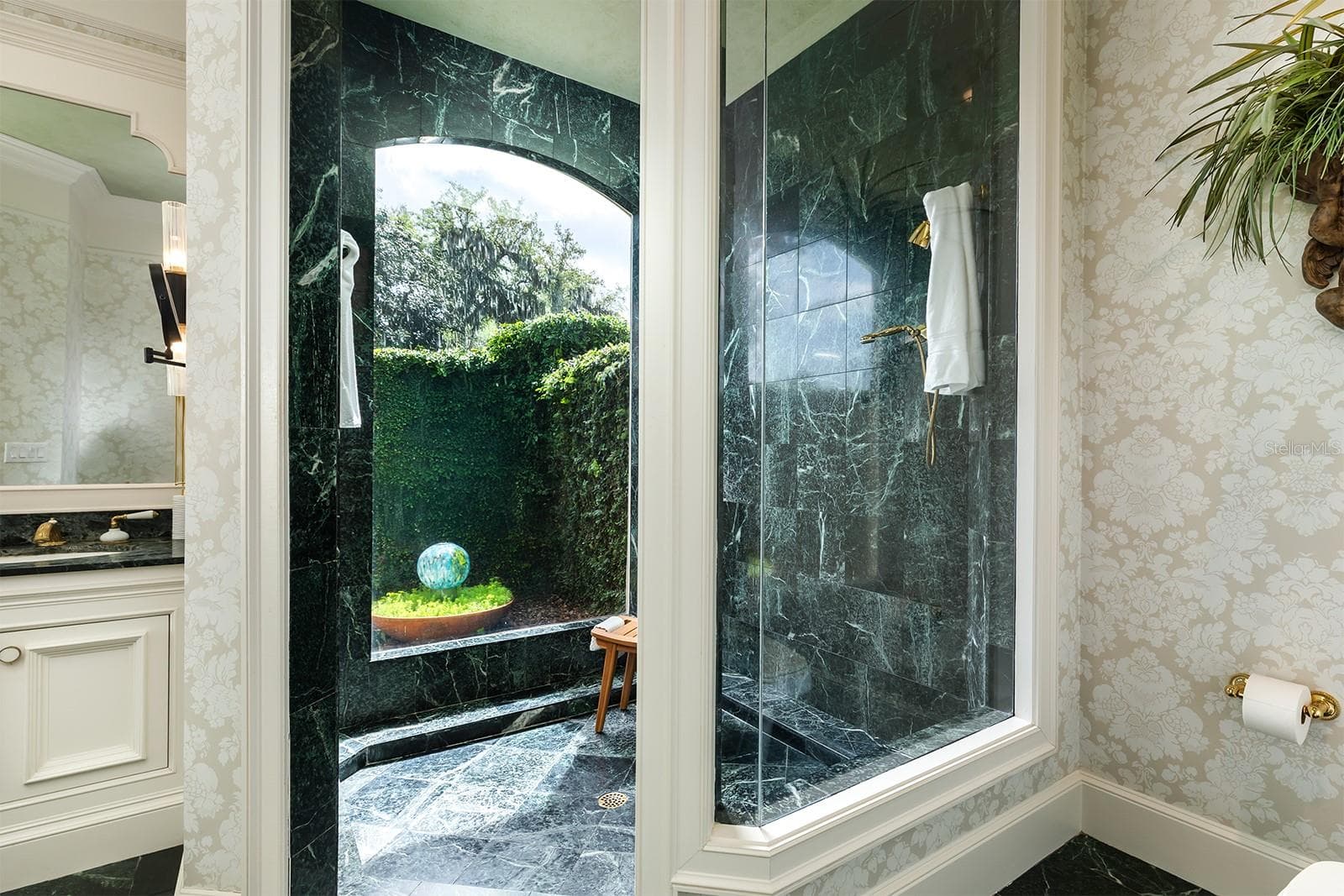 Such a serene space for showering with such an abundance of light peeking through. - 1351 N CLASSIC CT, LONGWOOD