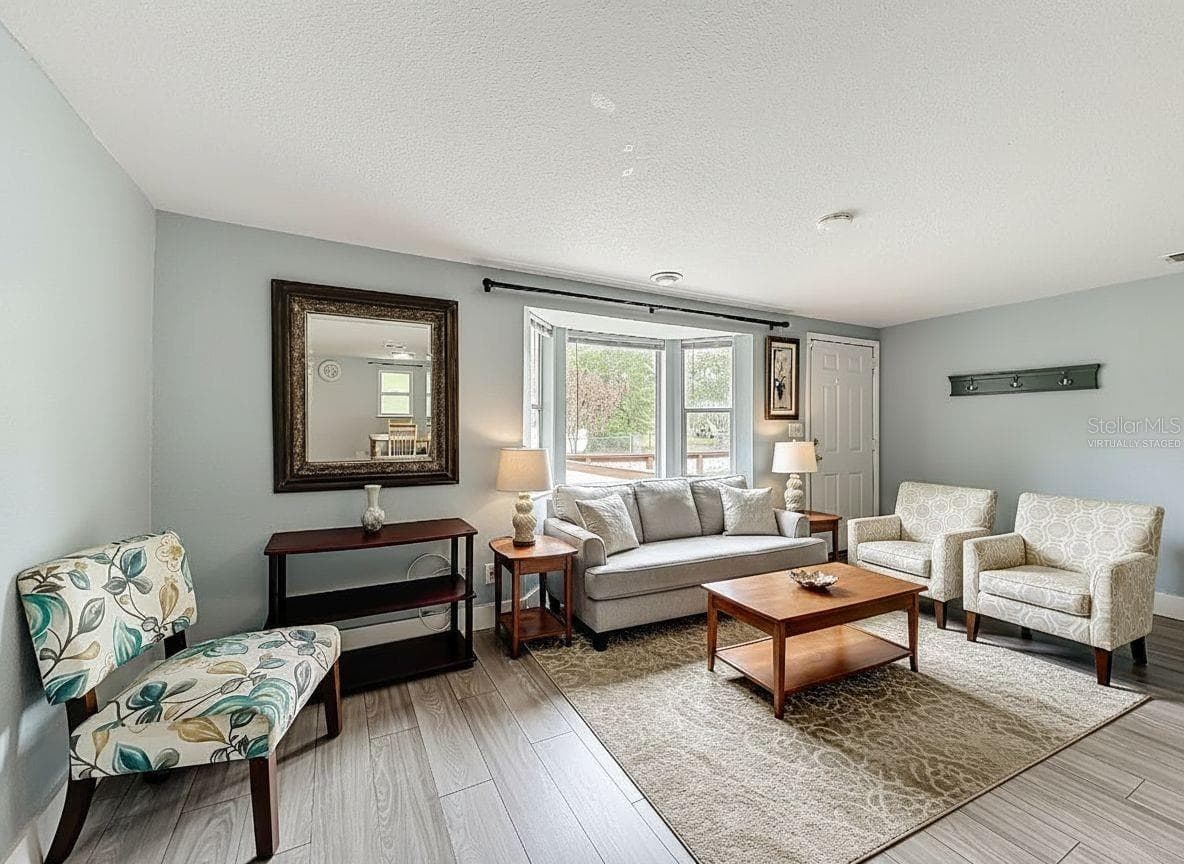 Virtually staged living room - 544 MERCURY AVE, ORLANDO