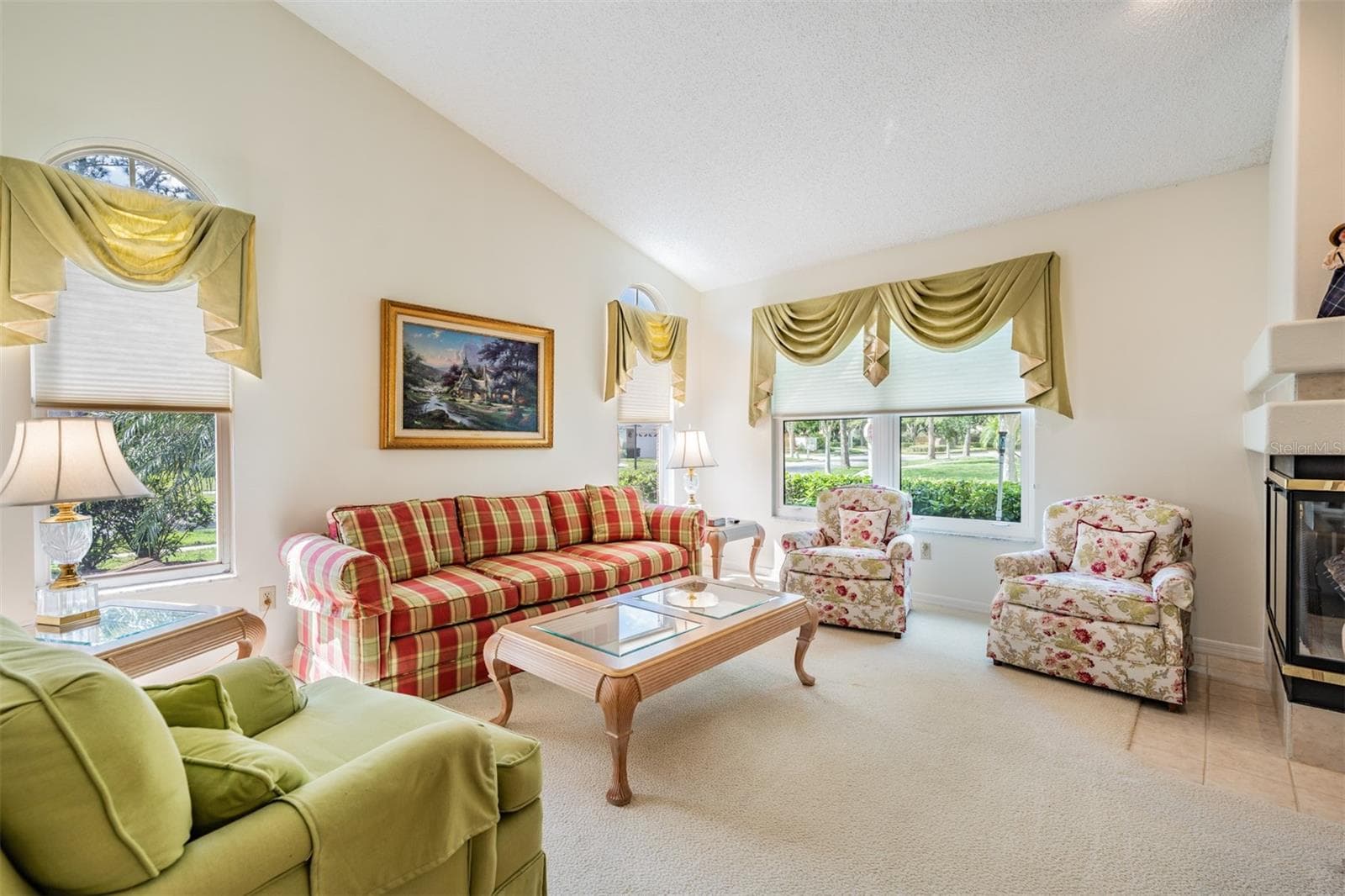 Living Room/Dining Room with Fireplace, lots of sunlight! - 9008 QUAIL CREEK DR, TAMPA