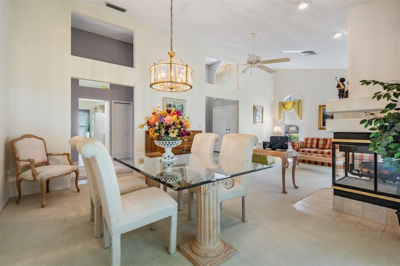Dining Room/Living Room and Fireplace - 9008 QUAIL CREEK DR, TAMPA