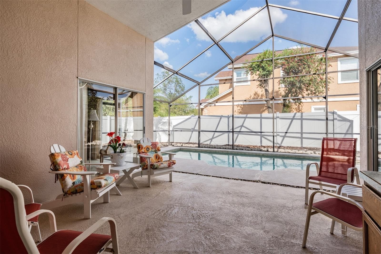 Covered area  by the pool. - 9008 QUAIL CREEK DR, TAMPA