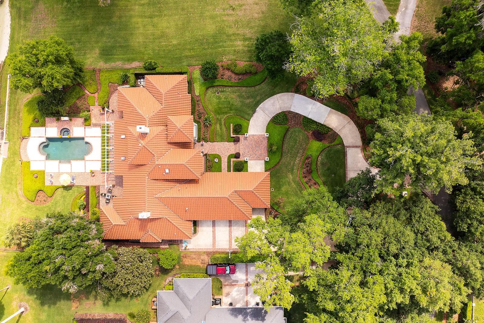 This estate is a custom-designed masterpiece crafted by a renowned local architectural firm. - 1351 N CLASSIC CT, LONGWOOD
