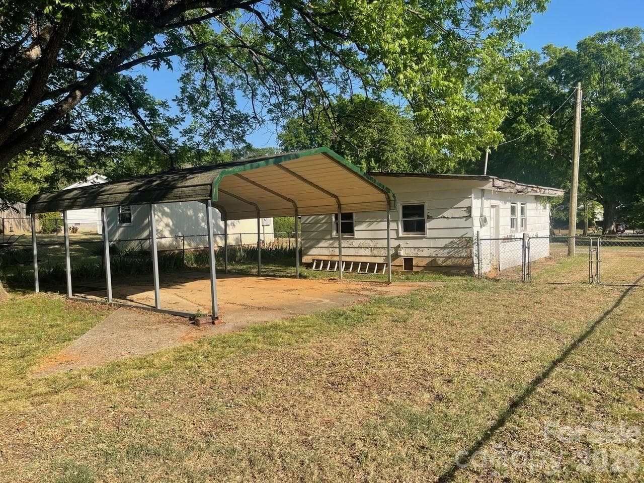 Back Yard Carport and Storage Building - 119 Pine Street, Badin