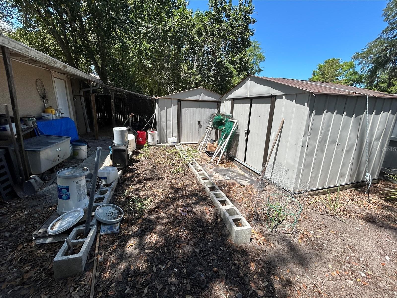 Rear Yard with storage - 629 HOLMES AVE, DAYTONA BEACH