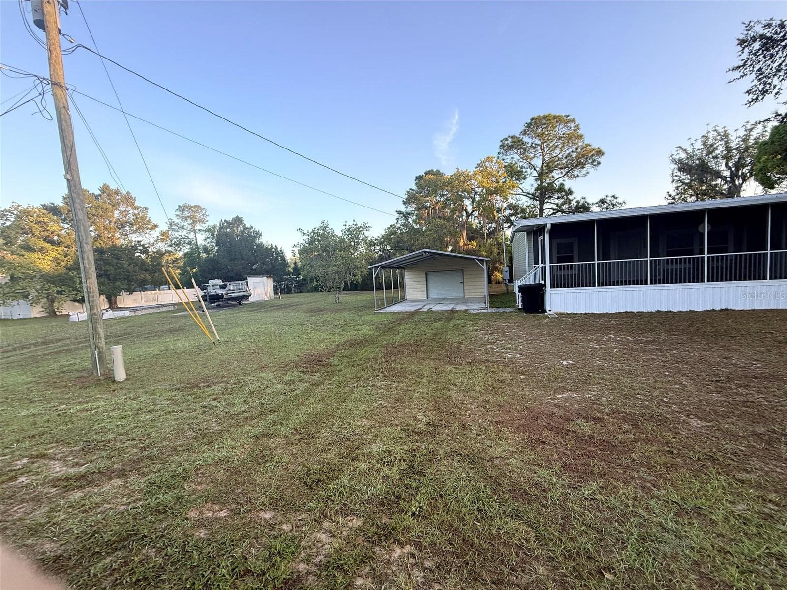 Manufactured Home at 21809 SUNSET DR, ASTOR, photo 2 of 12