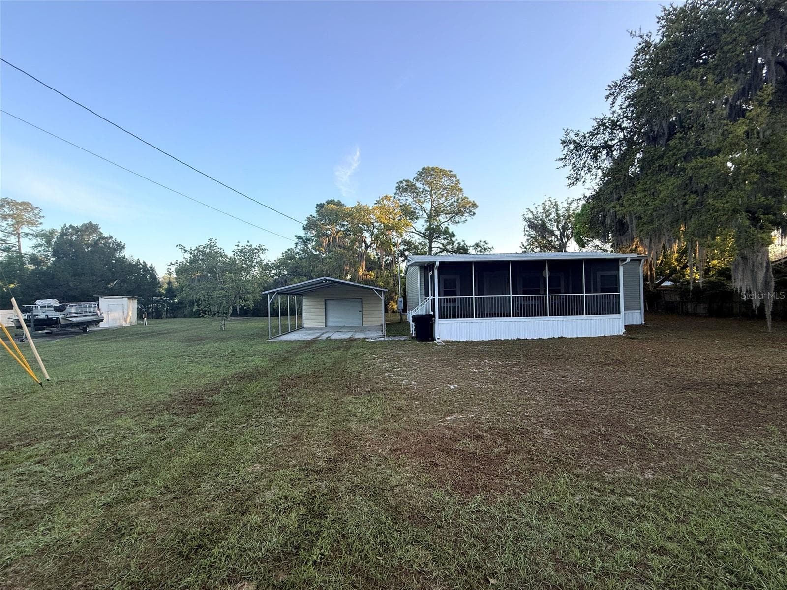 Manufactured Home at 21809 SUNSET DR, ASTOR, photo 3 of 12
