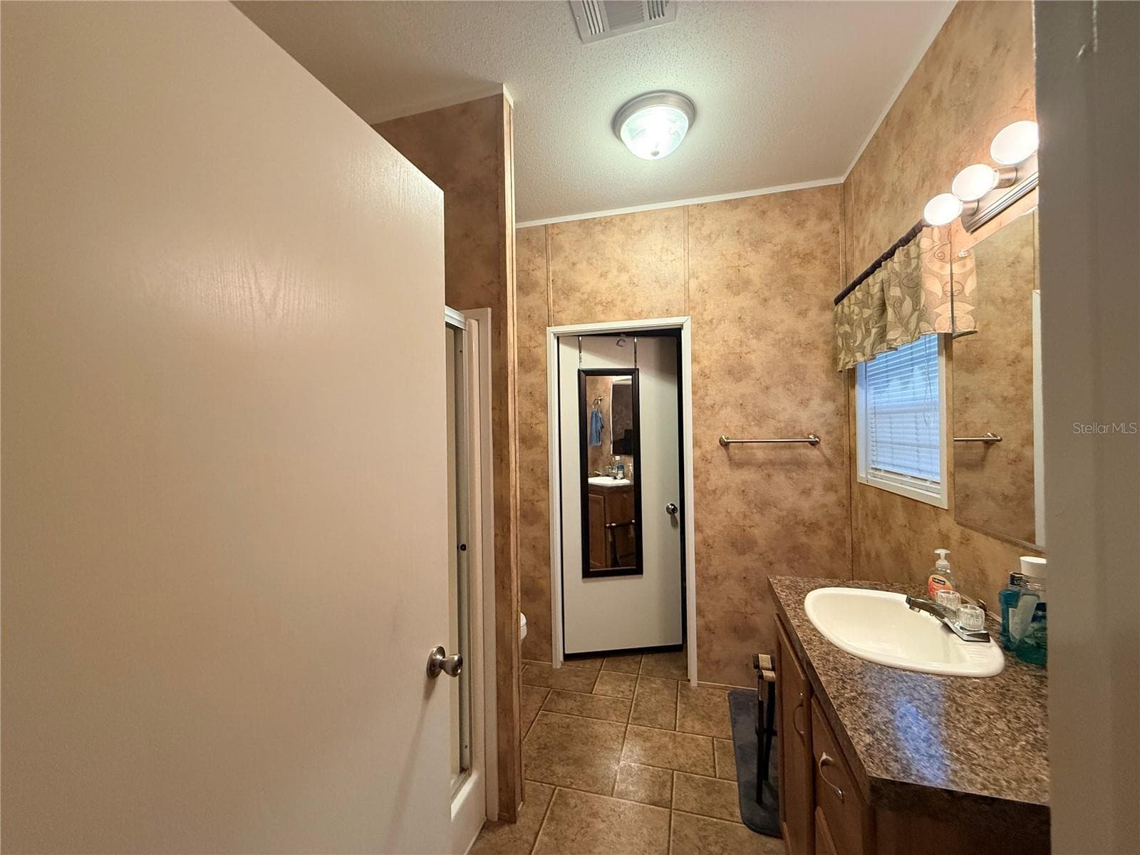 Manufactured Home at 21809 SUNSET DR, ASTOR, photo 9 of 12