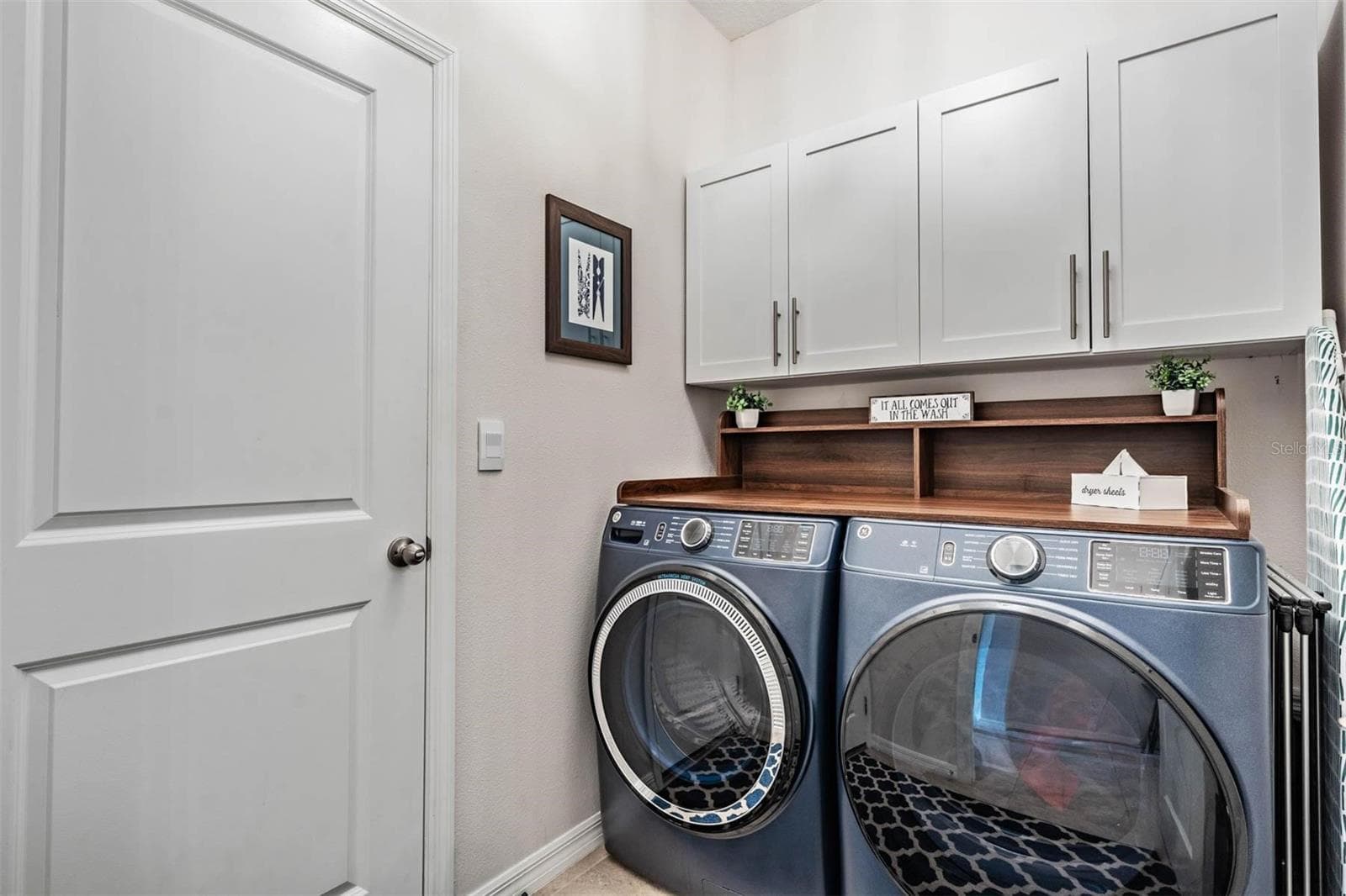 Laundry Room with extra storage - 6862 BROAD RIVER AVE, LAND O LAKES